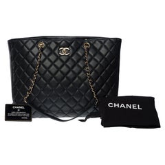 Amazing Chanel Grand Shopping Tote bag in black quilted lambskin leather, SHW