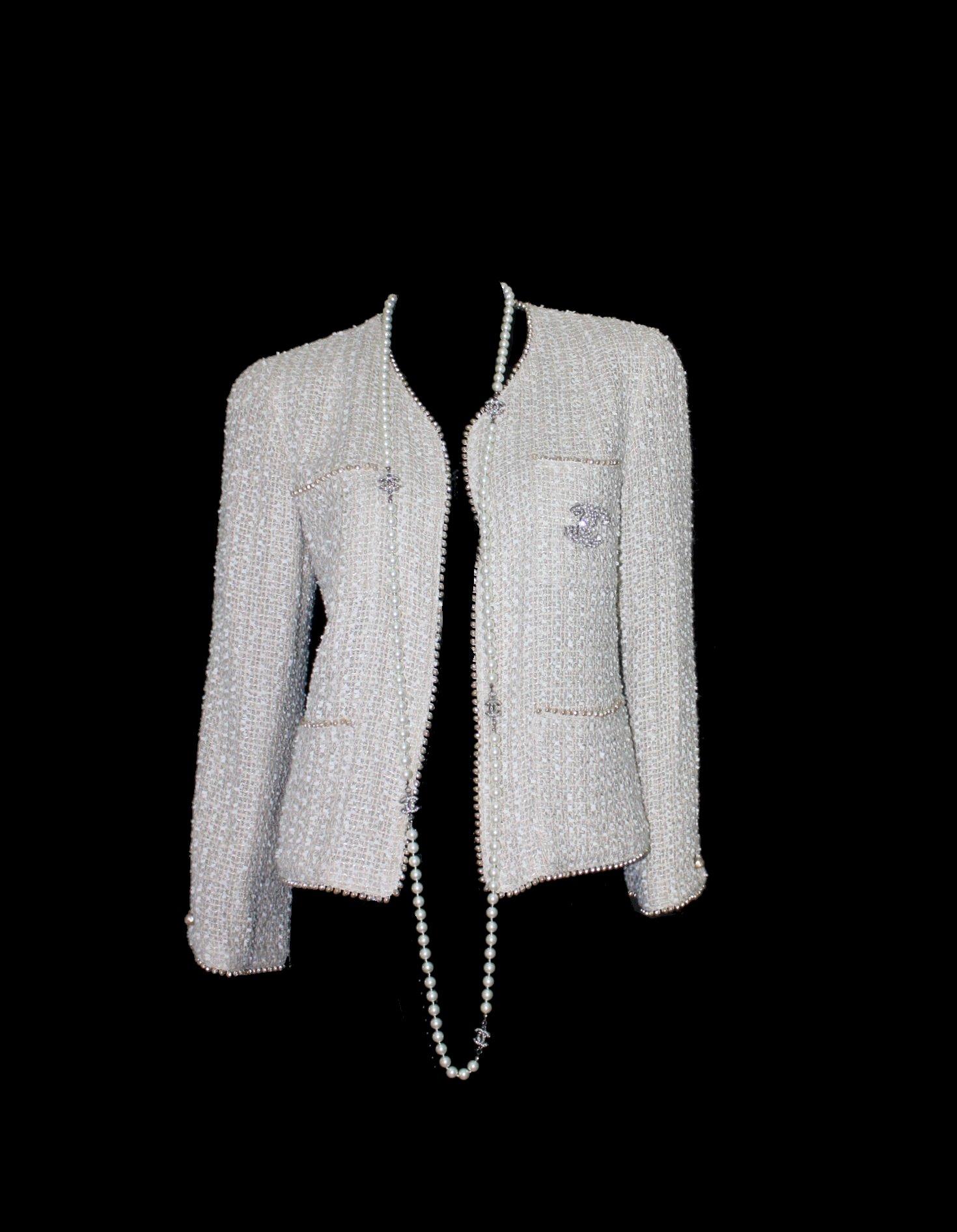 Beautiful Chanel Signature Skirt Suit
Designed by Karl Lagerfeld for Chanel
It doesn't get more COCO CHANEL than this suit
Consisting of two pieces - Skirt and Jacket
Signature fantasy tweed fabric by Maison Lesage produced exclusively for
