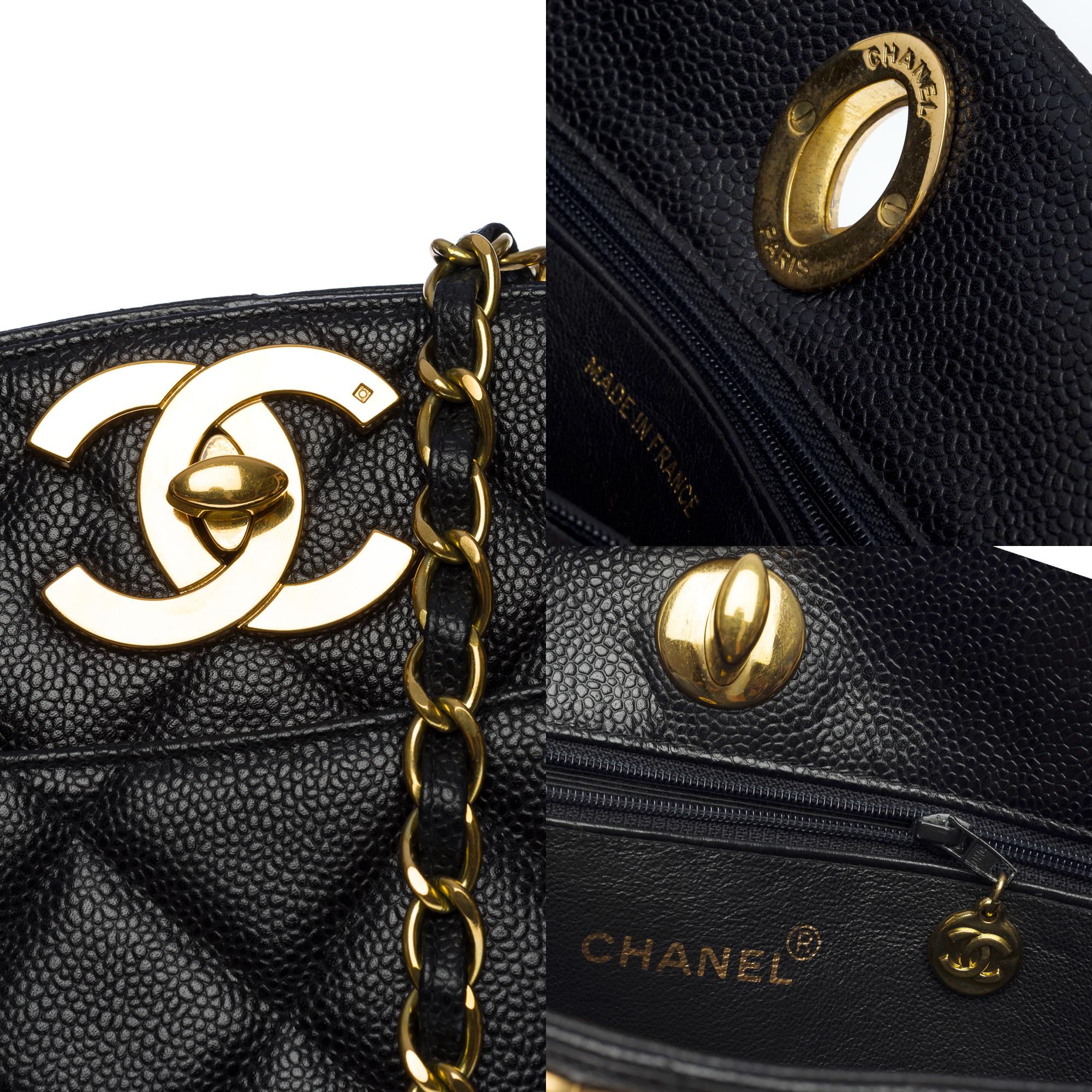 Amazing Chanel Shopping Tote in black Caviar quilted leather and gold hardware 1