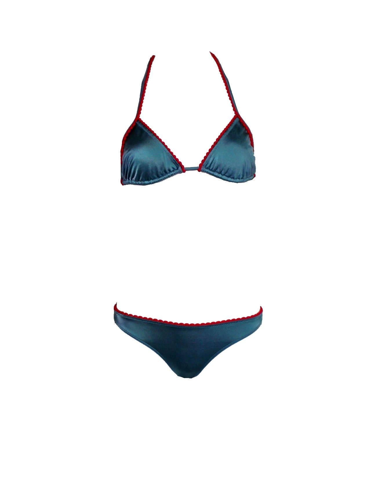     Classic CHANEL signature two-pieces bikini swimsuit
    Beautiful cut
    Two pieces
    Fully lined
    Comes brandnew with tags
Made in France
    Complete in the original Chanel packaging, intact hygenic protection, extra fabric  and care