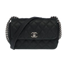 Amazing Chanel Timeless Mini flap shoulder bag in Black Caviar leather, SHW