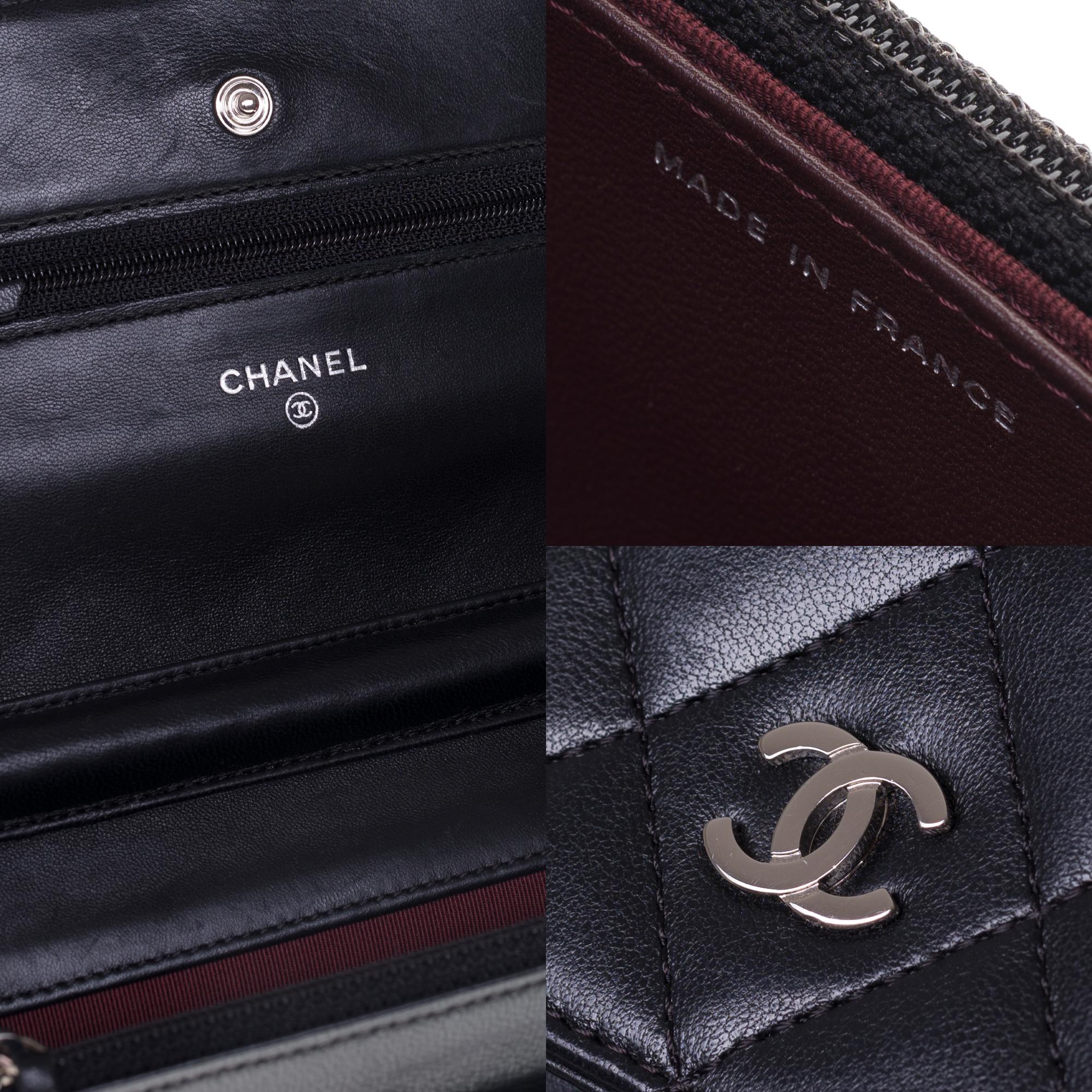 Amazing Chanel Wallet on Chain (WOC) shoulder bag in black quilted leather, SHW In Good Condition In Paris, IDF