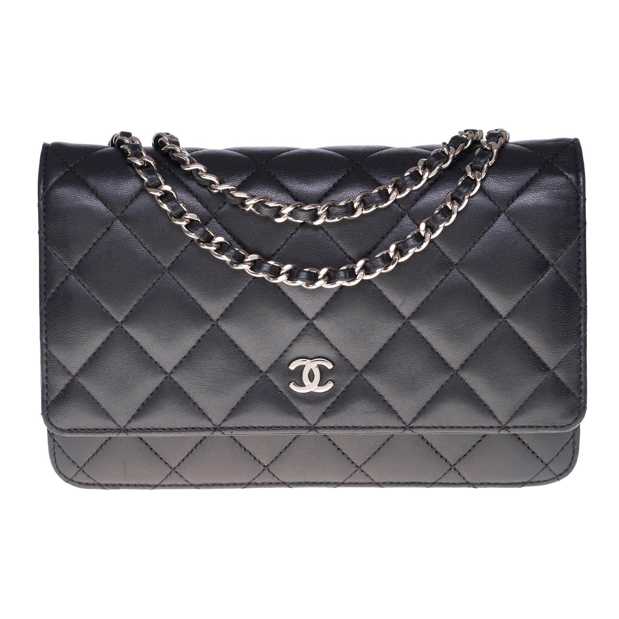 Amazing Chanel Wallet on Chain (WOC) shoulder bag in black quilted leather, SHW