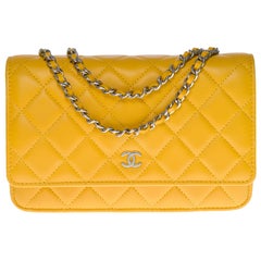 Amazing Chanel Wallet on Chain (WOC) shoulder bag in yellow quilted leather, SHW