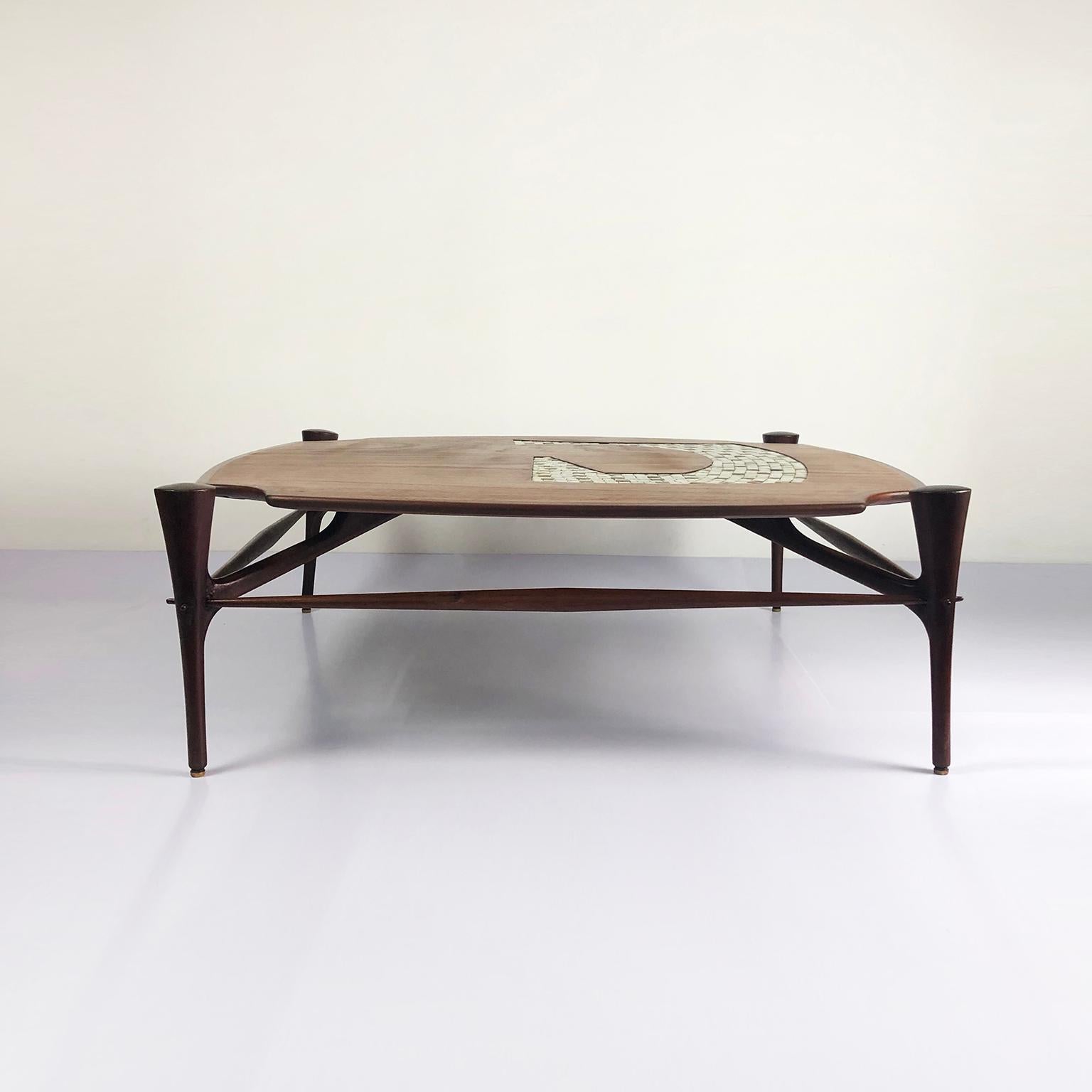 If you are searching for a piece that represents the most iconic and amazing Mexican Modernist era, we have for you this stunning and rare Frank Kyle Attributed Cocktail Table, made in mahogany wood, custom made in México city, circa 1960, a
