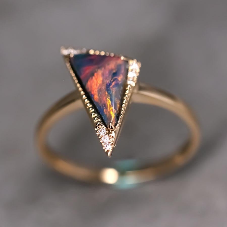 Amazing Color Triangle Australian Black Opal Diamond Engagement Ring 18K Yellow Gold.


Free Domestic USPS First Class Shipping!  Free One Year Limited Warranty!  Free Gift Bag or Box with every order!


Opal—the queen of gemstones, is one of the