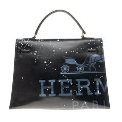 Amazing creation "Audrey Hepburn" on Kelly 32 cm handbag in black calfskin