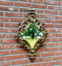 Incredibile design, specchio da parete barocco antico profondamente scolpito e dorato a mano