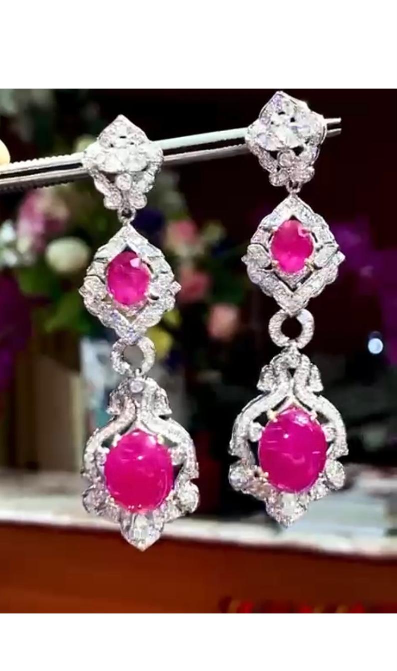 An exculsive Art Deco design , so exquisite , elegant , very glamour collection for sophisticate ladies.
Earrings come  in 18k gold with 4 pieces  of Natural Burma Rubies of 13 carats, fine grade, quality, t, excellent quality, and diamonds of 3,50