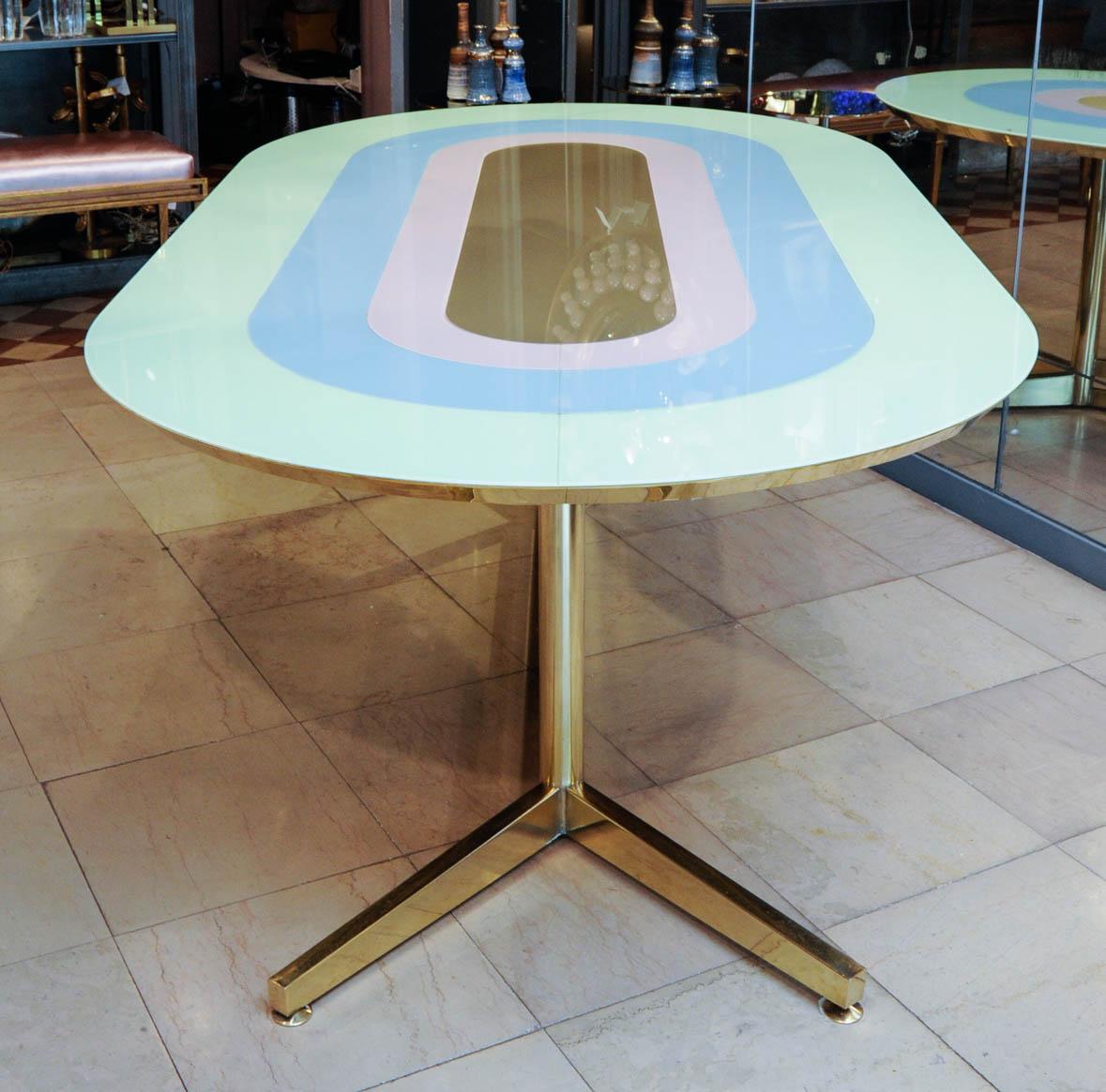 This table is made of brass, the top is covered with colored glass marquetry with brass fillets. This unique piece is designed by the Studio Glustin.
Several colors for the tops are available, special dimensions too on request.