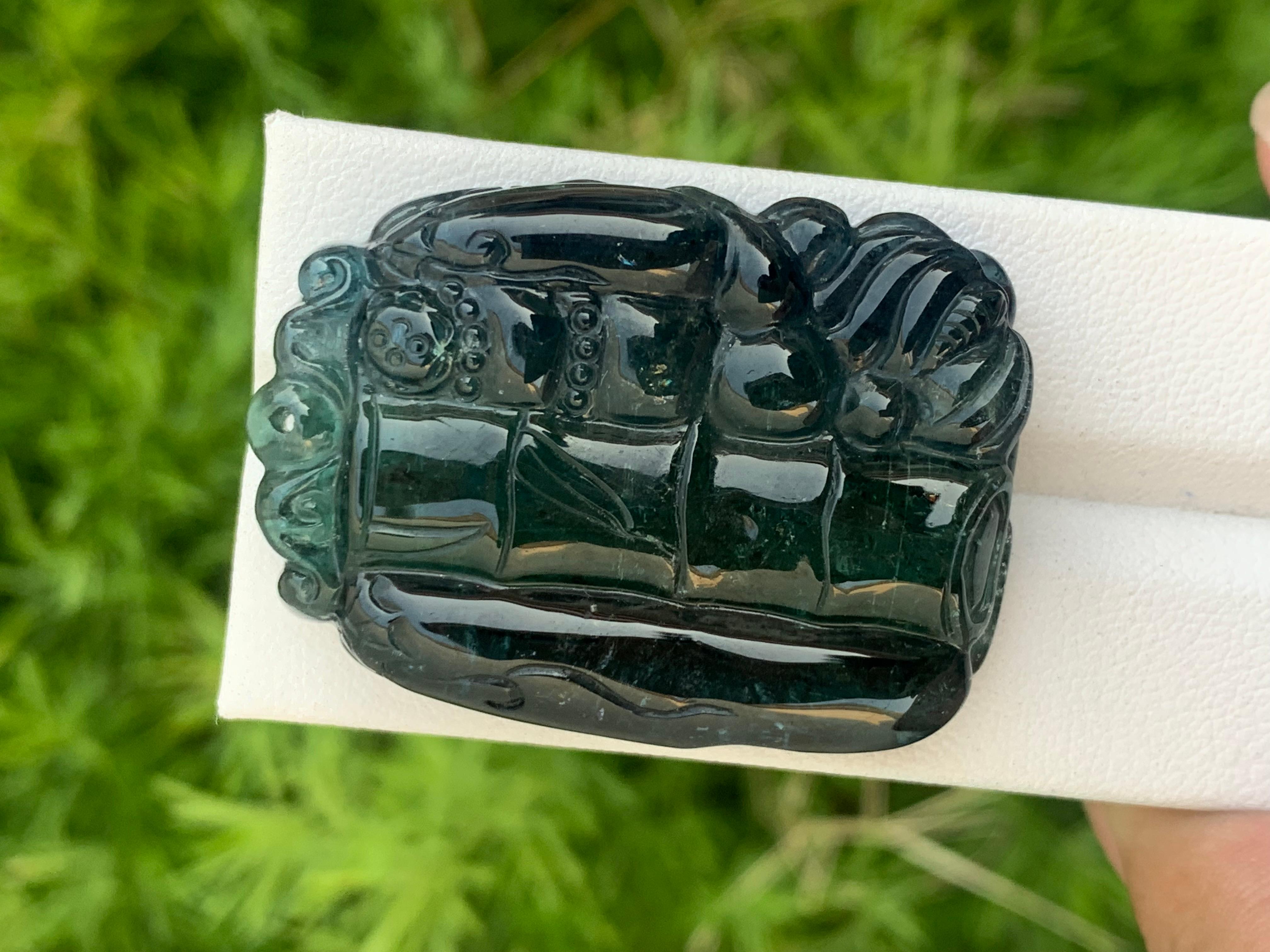 Bicolor Tourmaline Carved
Weight: 119.05 Carats
Dimension: 40x29x9.7 Mm
Origin: Africa
Color: Dark Neon Blue
Shape: Carving
Quality: AAA
Certificate: On demand
Drilled: Yes
.
Bicolor tourmaline is connected to the heart chakra, which makes it good