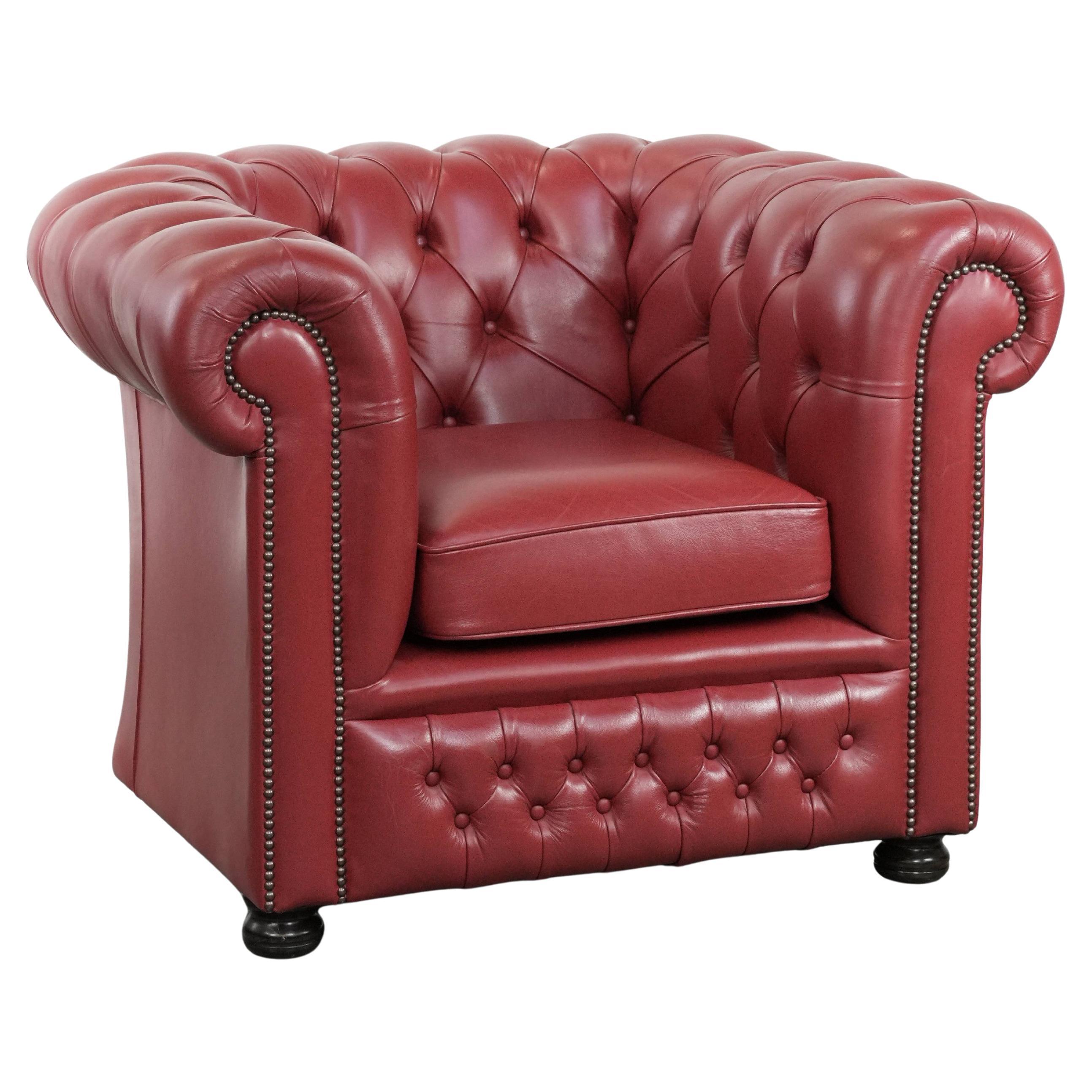 Amazing English cowhide Chesterfield armchair in a stunning red colour