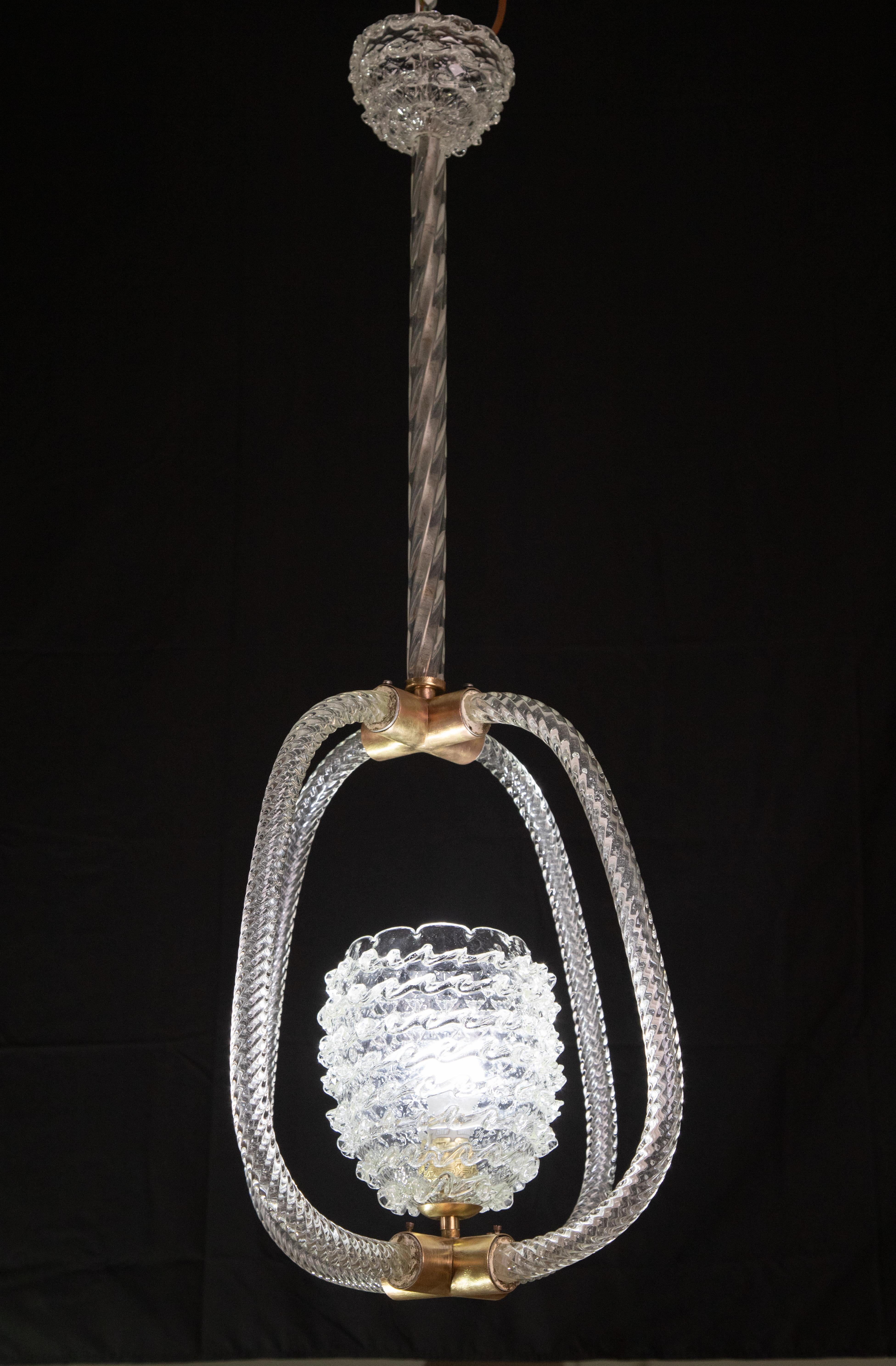 Splendid Art Deco chandelier attribuited to Ercole Barovier made by the glassworks Barovier & Toso in the 1940s-1950s.
The chandelier is 100 cm high and measures 40 cm wide.
The glass elements make this pendant extremely unique.
All the glass and