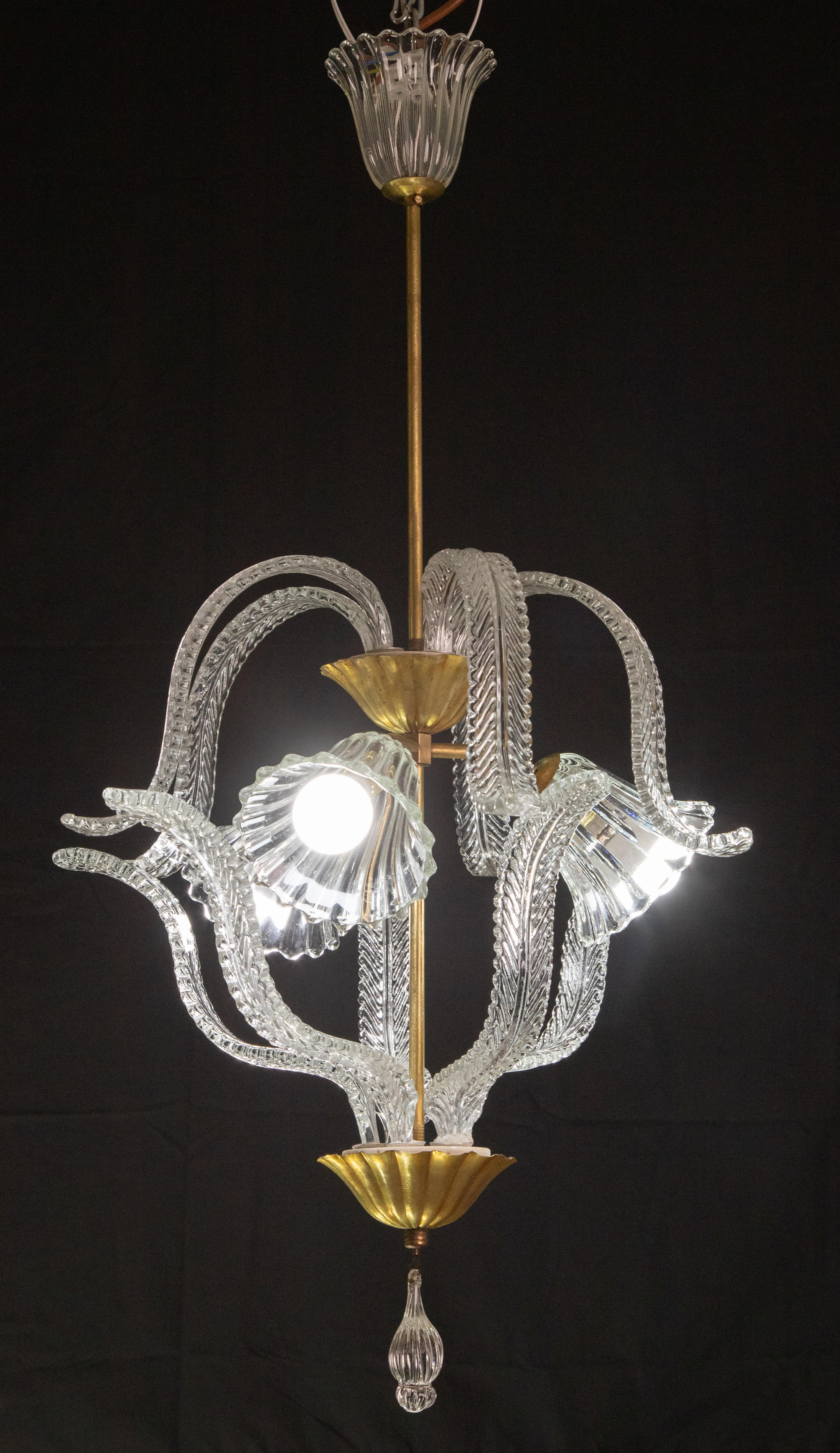 Splendid Art Deco chandelier attribuited to Ercole Barovier made by the glassworks Barovier & Toso in the 1940s-1950s.
The chandelier is 90 cm high and measures 60 cm wide.
The glass elements make this tree-cup pendant extremely unique.
All the