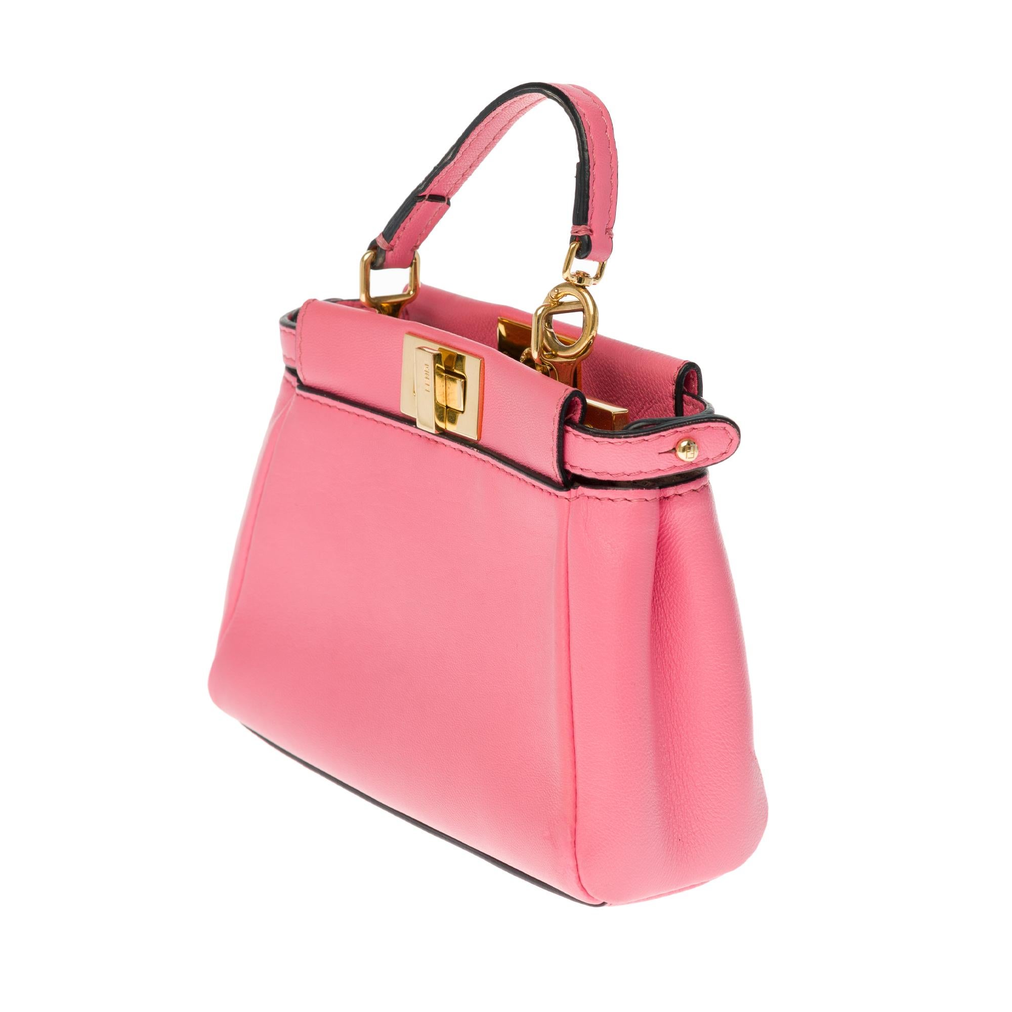 Pink Amazing Fendi Micro Peekaboo shoulder bag in pink leather and gold hardware 