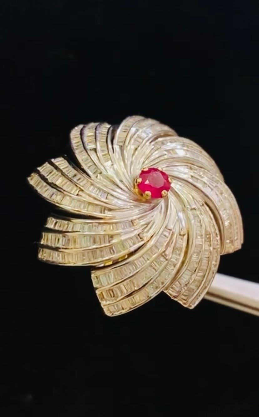 From flowers collection, gorgeous design in 14k gold with baguettes cut diamonds ct 4,82 H/SI and ruby ct 2,30. 
Handmade fine Jewels by artisan goldsmith.
Excellent manufacture and quality.

Note: I have also options of shipment from Europe for