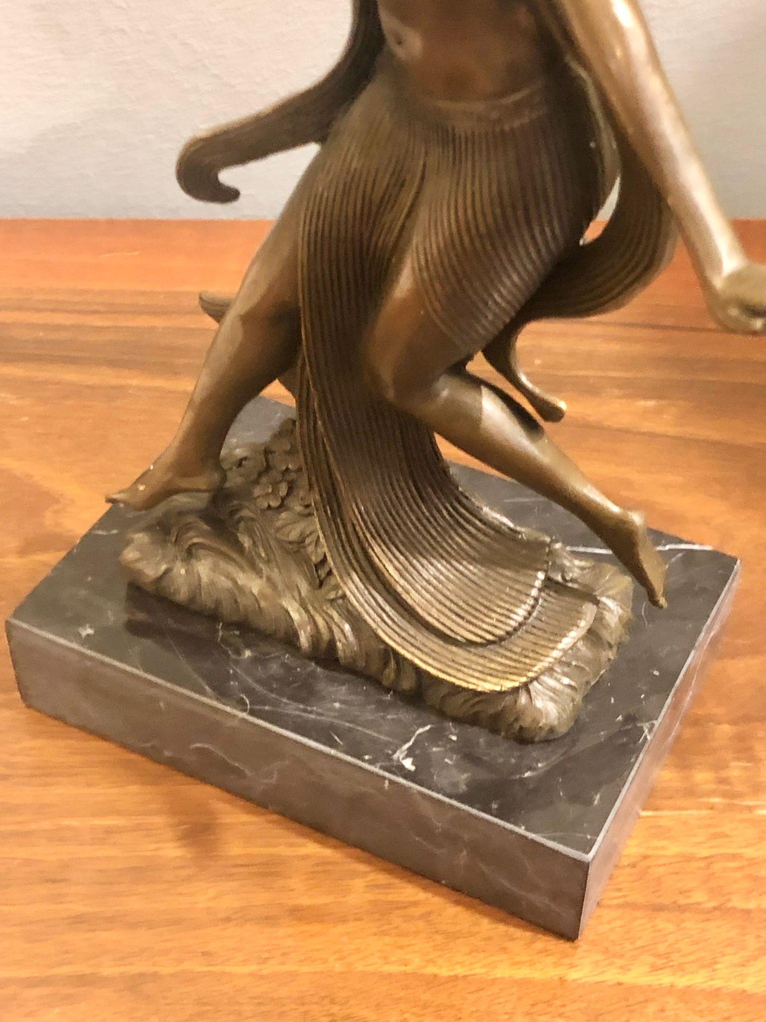 Amazing French bronze sculpture, depicting a woman in Plastic Pose. Art Deco' Style, France 1960.
Beautiful Patina.
Dimensions of the black marble base: Depth 10 Width 14 Height 3 Inches.

 