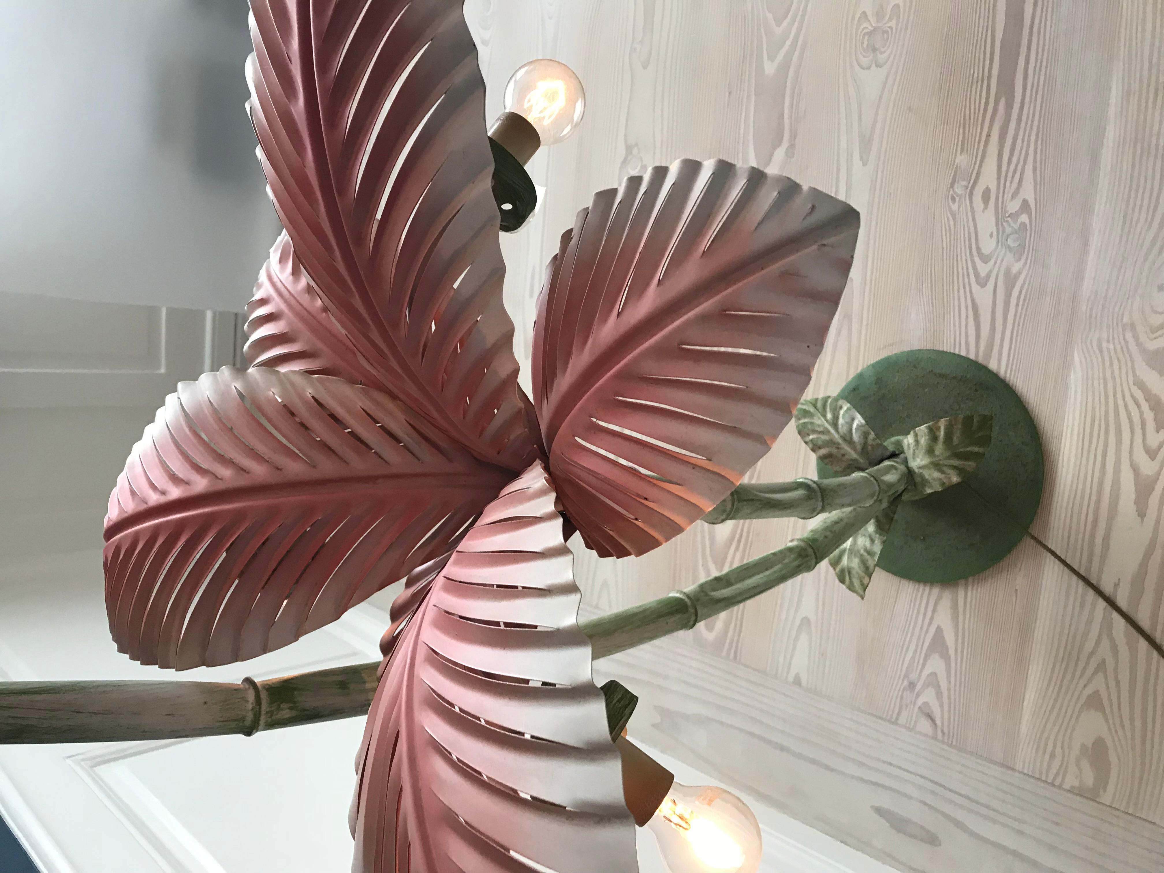 French vintage floor lamp in the shape of a palm tree with pale pink painted metal leaves.