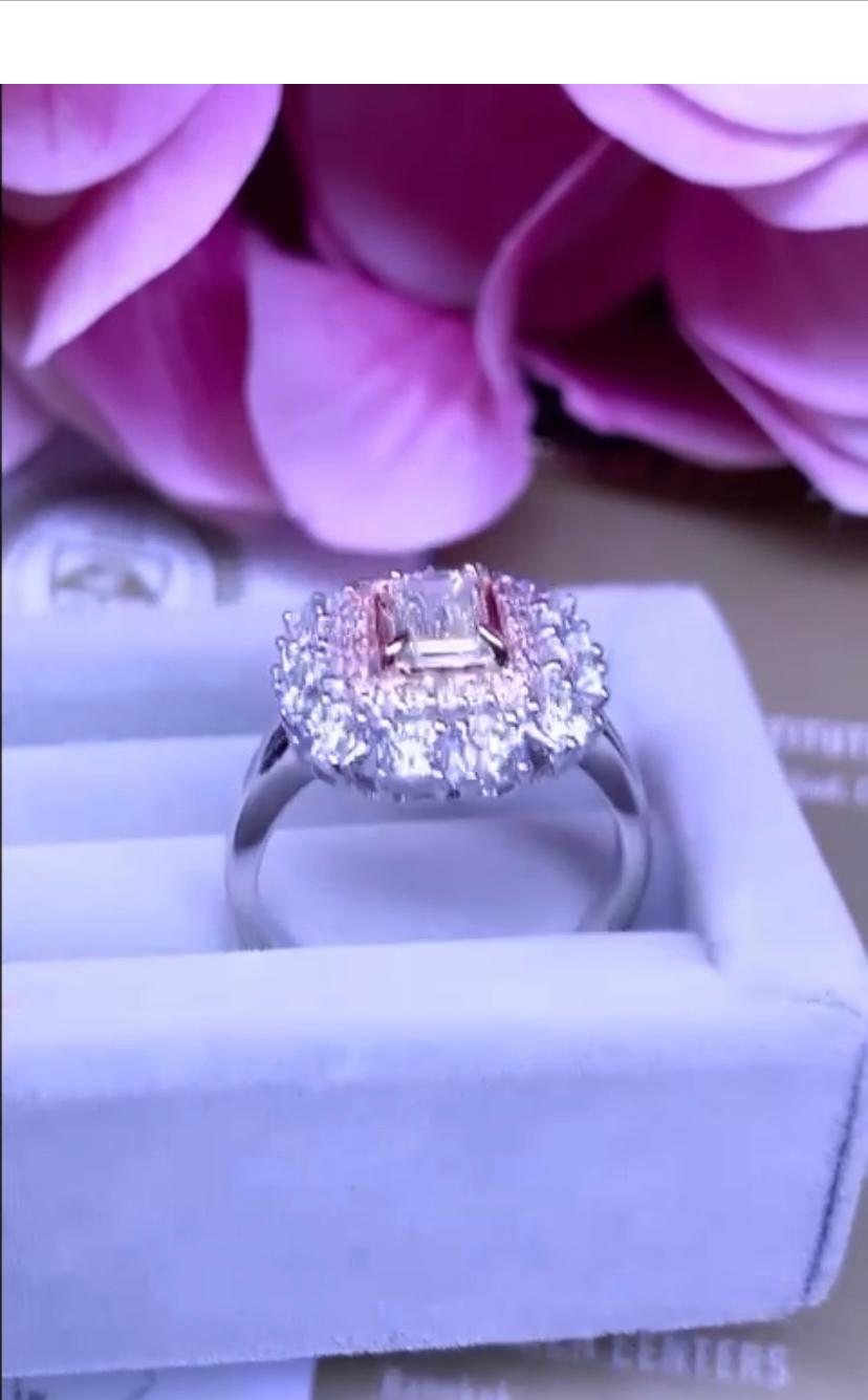 An exclusive flowers design ring, so gorgeous and refined, perfect for all events. Ring come in 18k gold with a GIA certified natural emerald cut diamond of 0,61 , J/VVS1, and natural diamonds in round brilliant of 1,34 ,F/VS. 
Handcrafted by