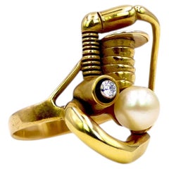 Superbe bague en or de Claude Wesel, sertie d'une perle et de diamants