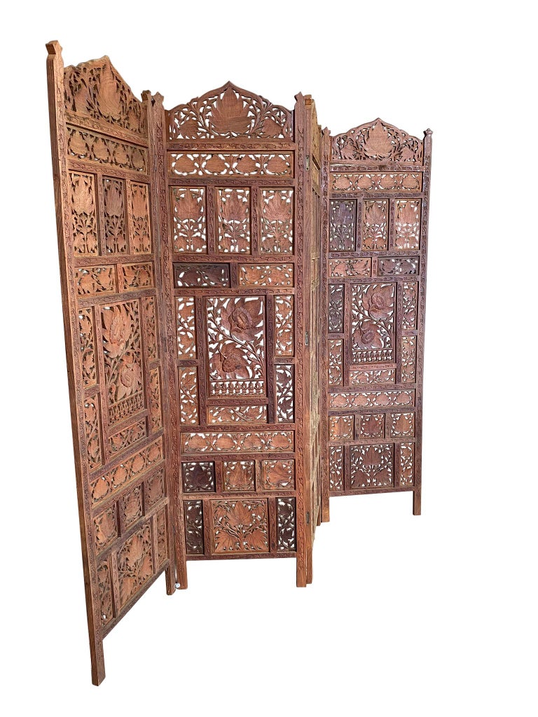 Amazing hand carved hardwood 4 panel room divider  folding screen handmade. Beautiful floral room divider. Steel hinges. No labels. Very heavy hardwood. One of a kind. (4) Panels that measure 72