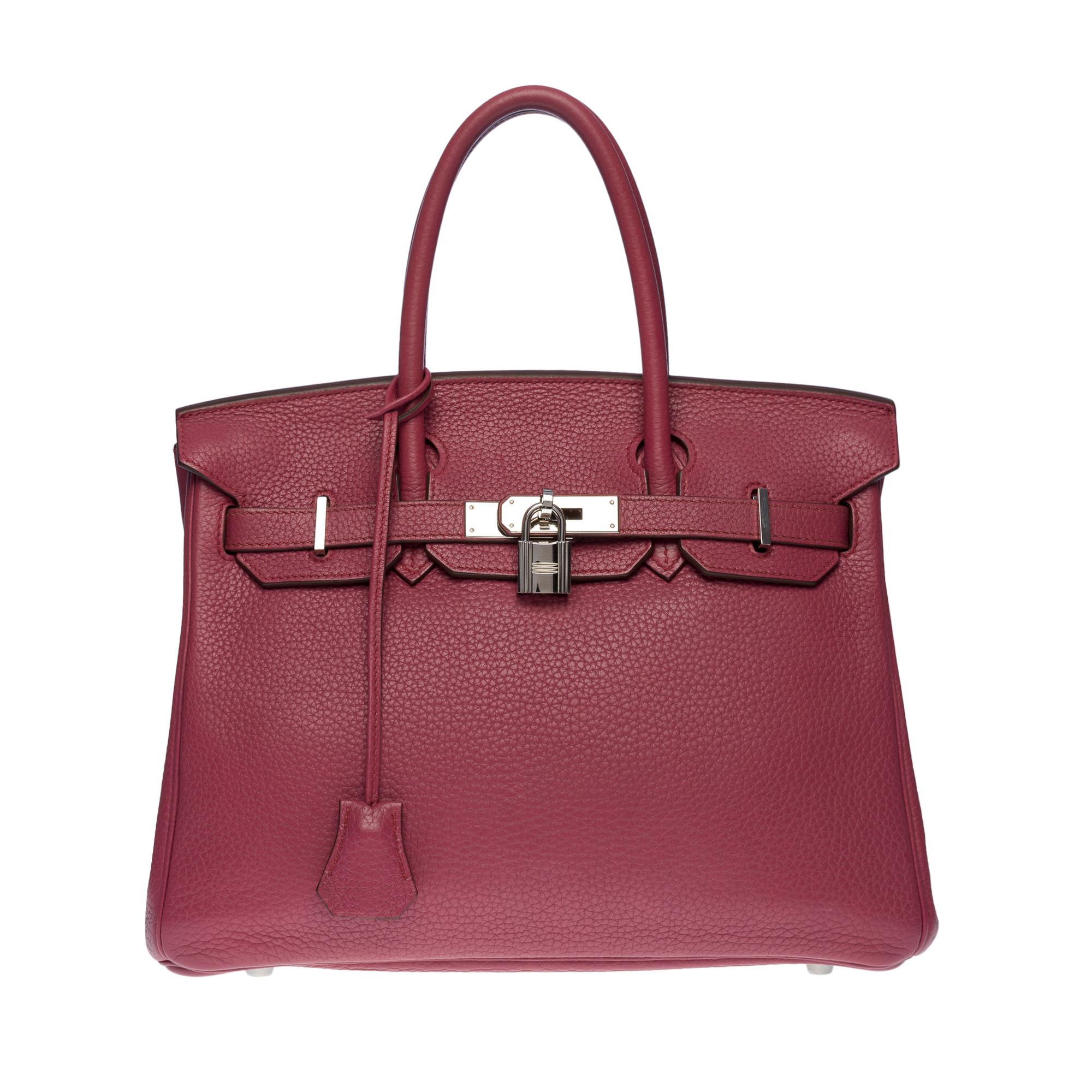 Exquisite Hermes Birkin 30 handbag in bois de rose Togo leather, palladium silver metal hardware, double handle in bois de rose leather allowing a hand-carried

Flap closure
Inside lining in towed leather, one zippered pocket, one patch