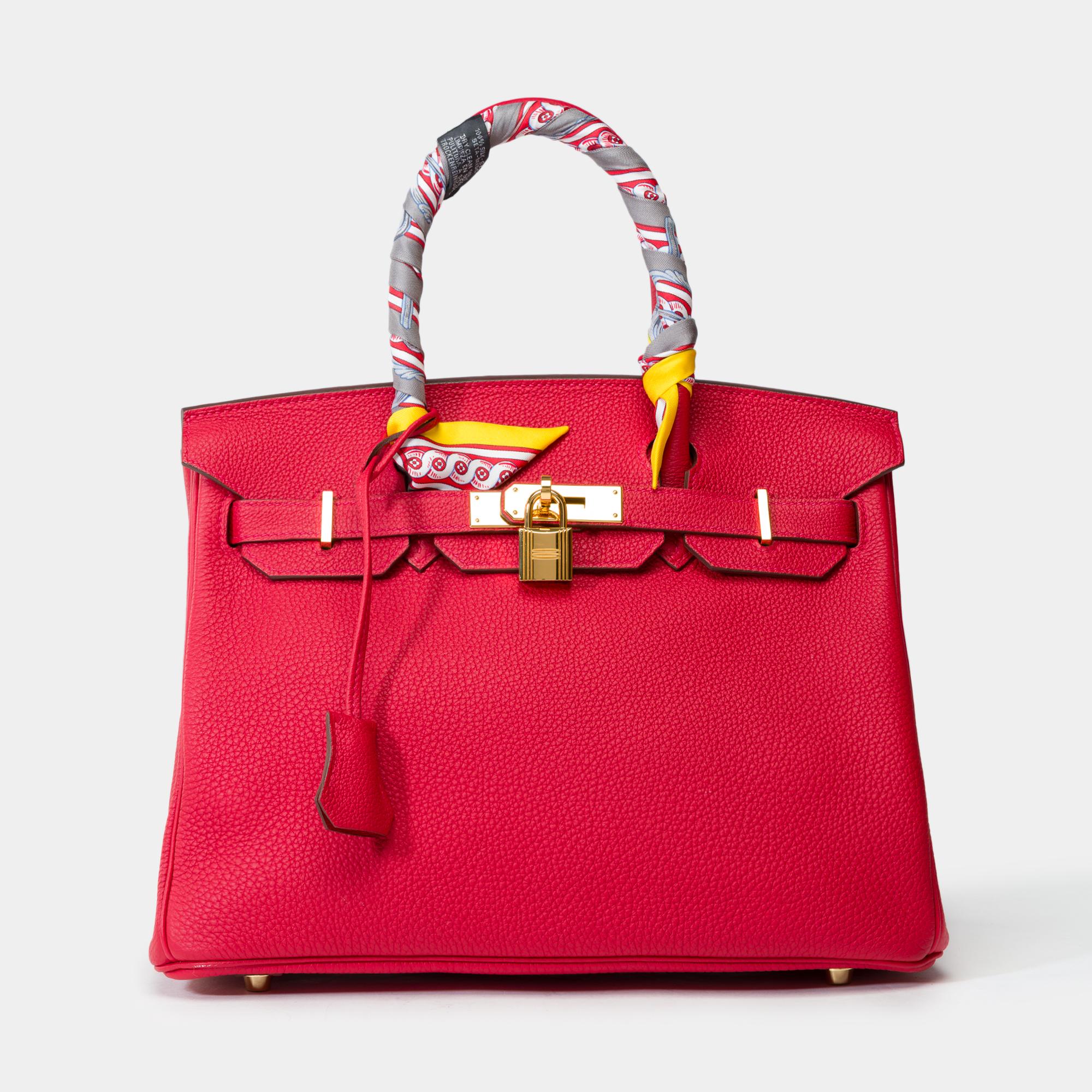 Exceptional​ ​Hermes​ ​Birkin​ ​30​ ​handbag​ ​in​ ​Rouge​ ​Casaque​ ​Togo​ ​leather,​ ​with​ ​gold-plated​ ​hardware​ ​and​ ​double​ ​red​ ​leather​ ​handles​ ​for​ ​hand​ ​carry

Flap​ ​closure
Interior​ ​lining​ ​in​ ​red​ ​leather,​ ​with​ ​one​