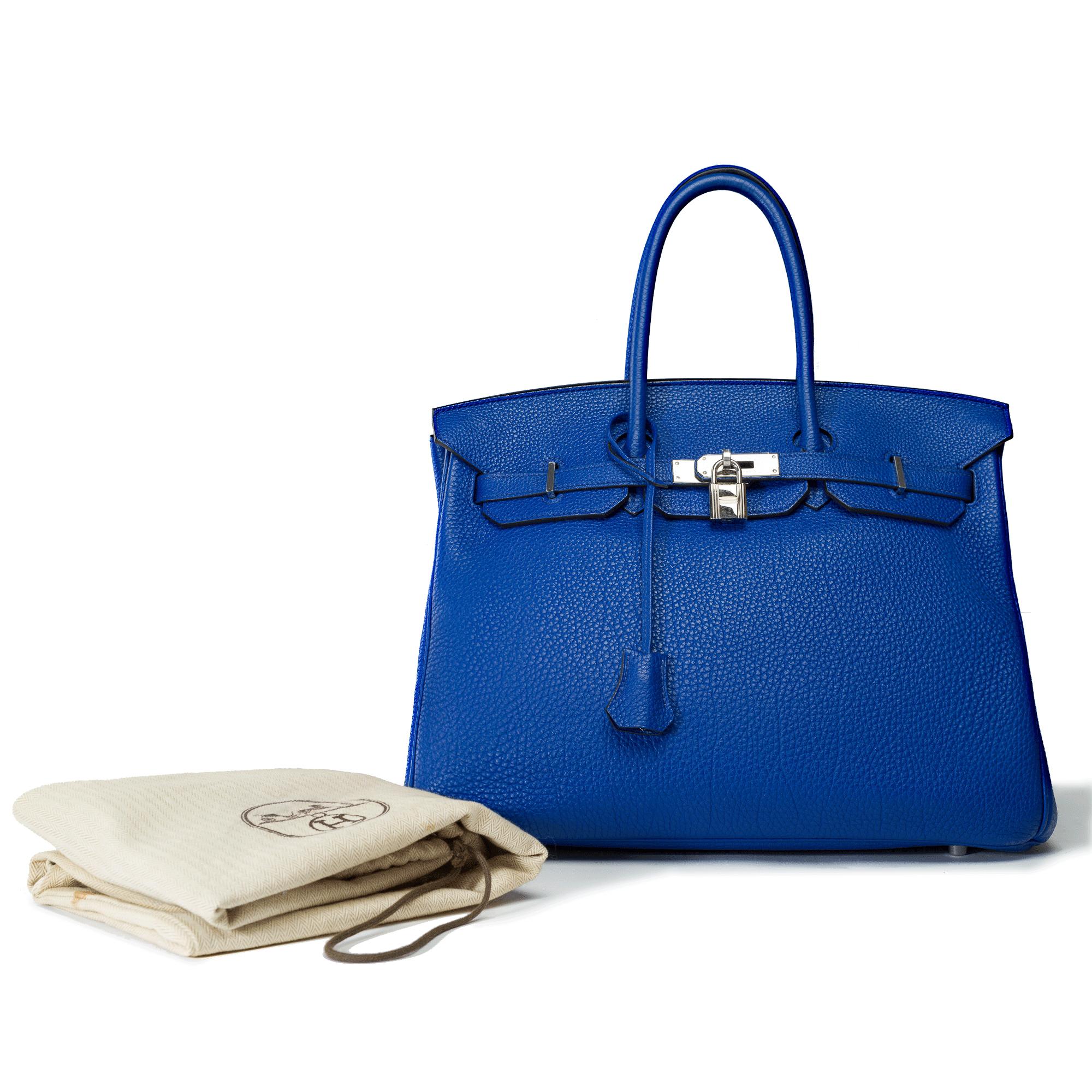 Beautiful​ ​Hermes​ ​Birkin​ ​35​ ​handbag​ ​in​ ​electric​ ​blue​ ​Togo​ ​leather,​ ​silver​ ​palladium​ ​metal​ ​trim,​ ​double​ ​blue​ ​leather​ ​handles​ ​allowing​ ​for​ ​hand​ ​carry

Flap​ ​closure
Interior​ ​lining​ ​in​ ​blue​ ​leather,​
