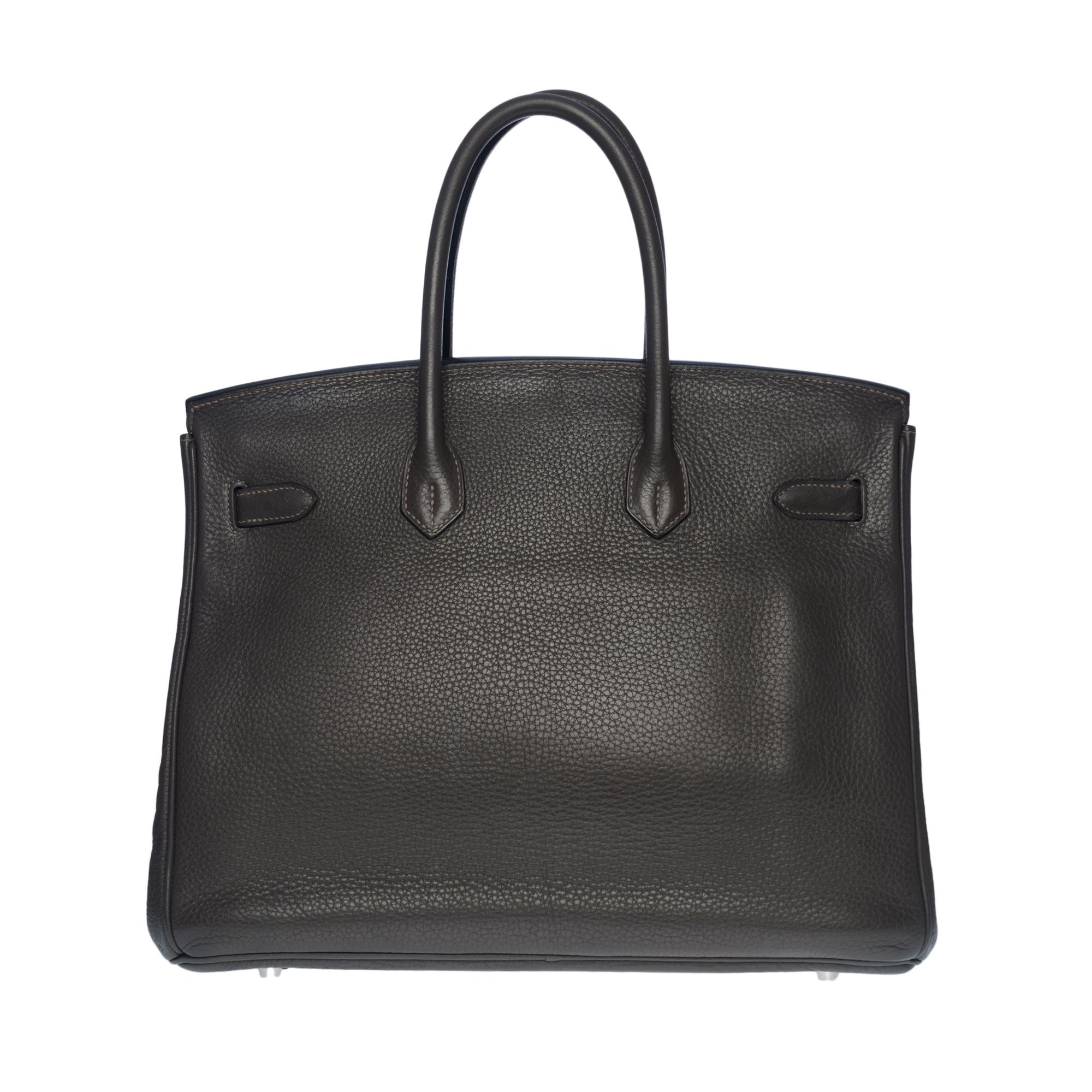 Beautiful Hermes Birkin 35 cm handbag in grey Togo leather Etain, silver metal palladium hardware, double handle in grey leather allowing a hand carried
Closure by flap
Lining in grey leather, a zipped pocket, a patch pocket
Signature: 