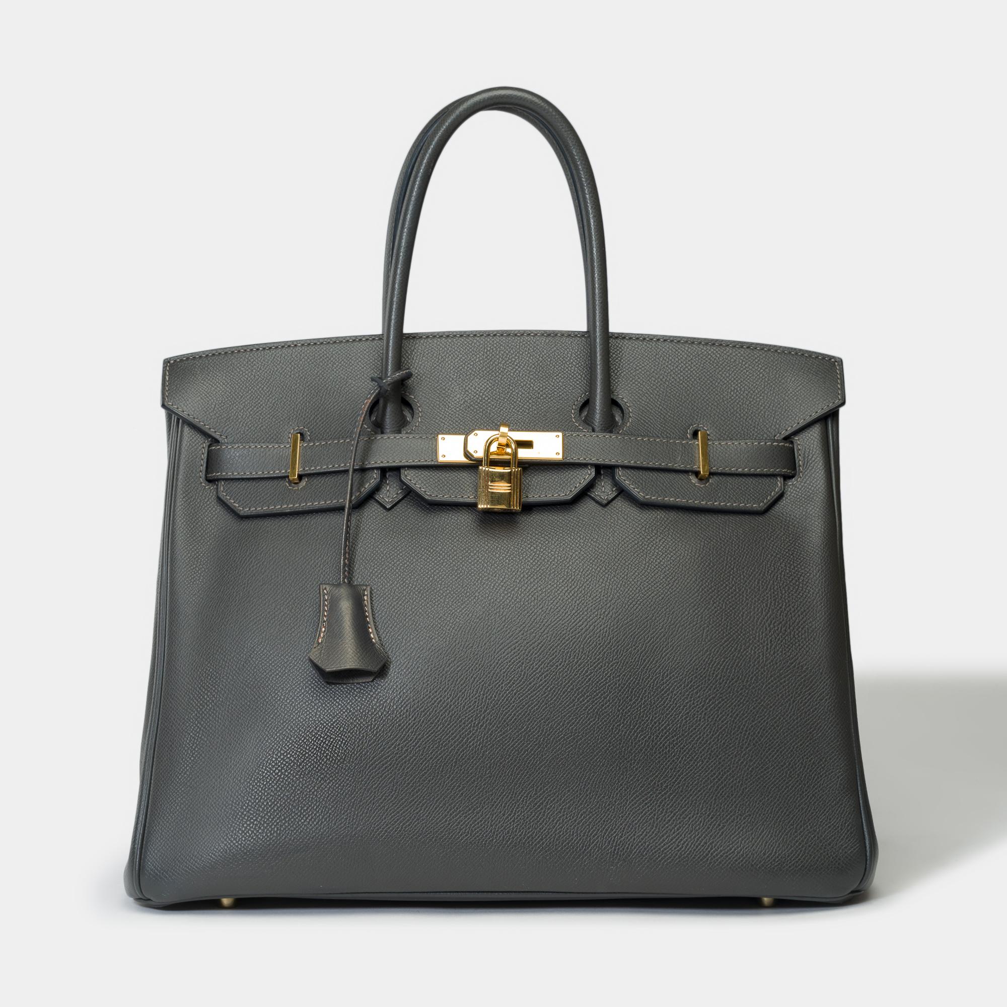 Amazing​ ​Hermes​ ​Birkin​ ​35​ ​handbag​ ​in​ ​Gray​ ​Graphite​ ​Epsom​ ​leather,​ ​gold​ ​plated​ ​metal​ ​trim​ ​,​ ​double​ ​handle​ ​in​ ​gray​ ​leather​ ​allowing​ ​a​ ​hand​ ​carry

Flap​ ​closure
Grey​ ​leather​ ​inner​ ​lining,​ ​one​