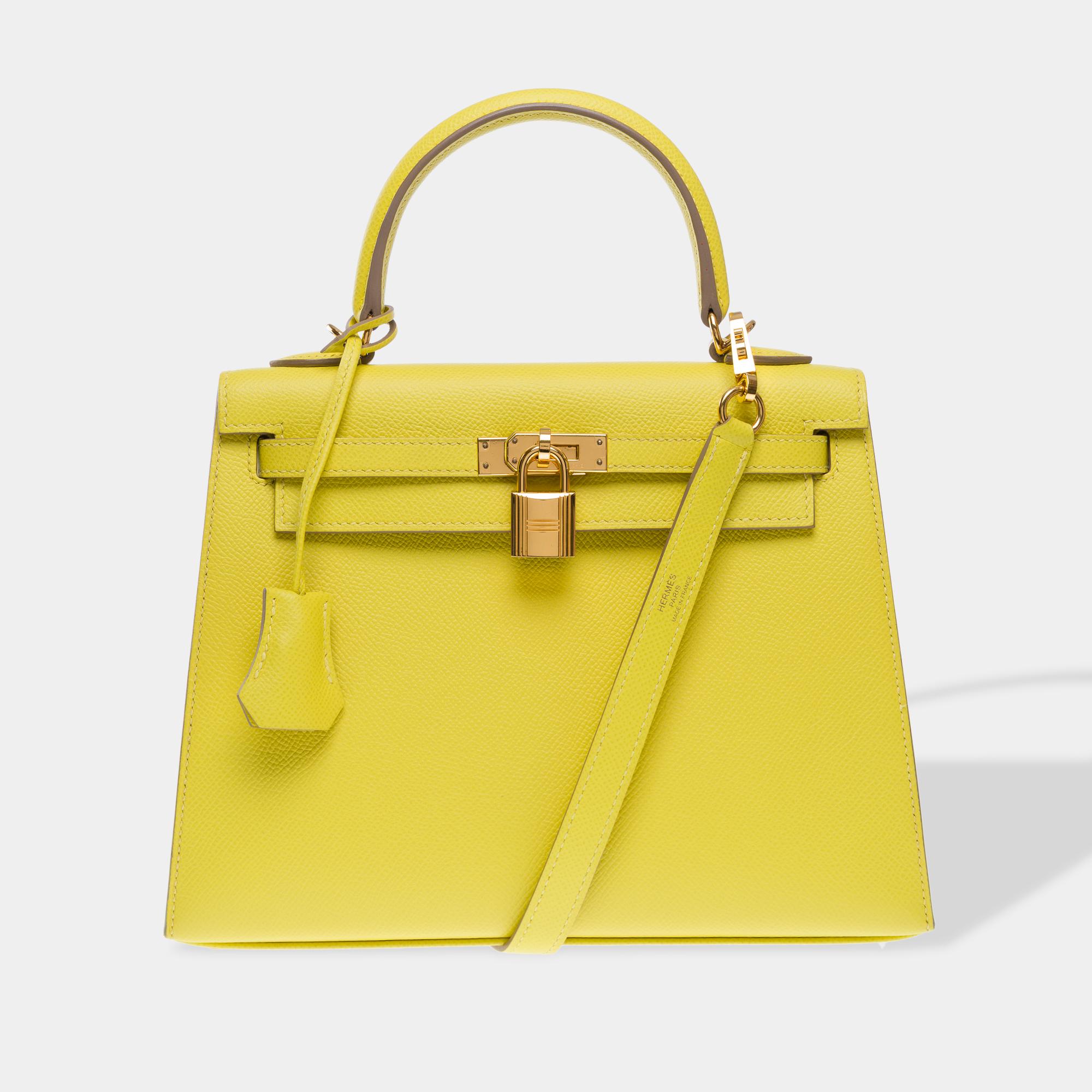 Exceptional​ ​Hermes​ ​Kelly​ ​25​ ​saddle​ ​shoulder​ ​bag​ ​in​ ​lime​ ​yellow​ ​Epsom​ ​calfskin,​ ​gold​ ​metal​ ​trim,​ ​single​ ​handle​ ​in​ ​green​ ​epsom​ ​leather,​ ​one​ ​removable​ ​shoulder​ ​strap​ ​in​ ​green​ ​epsom​ ​leather​