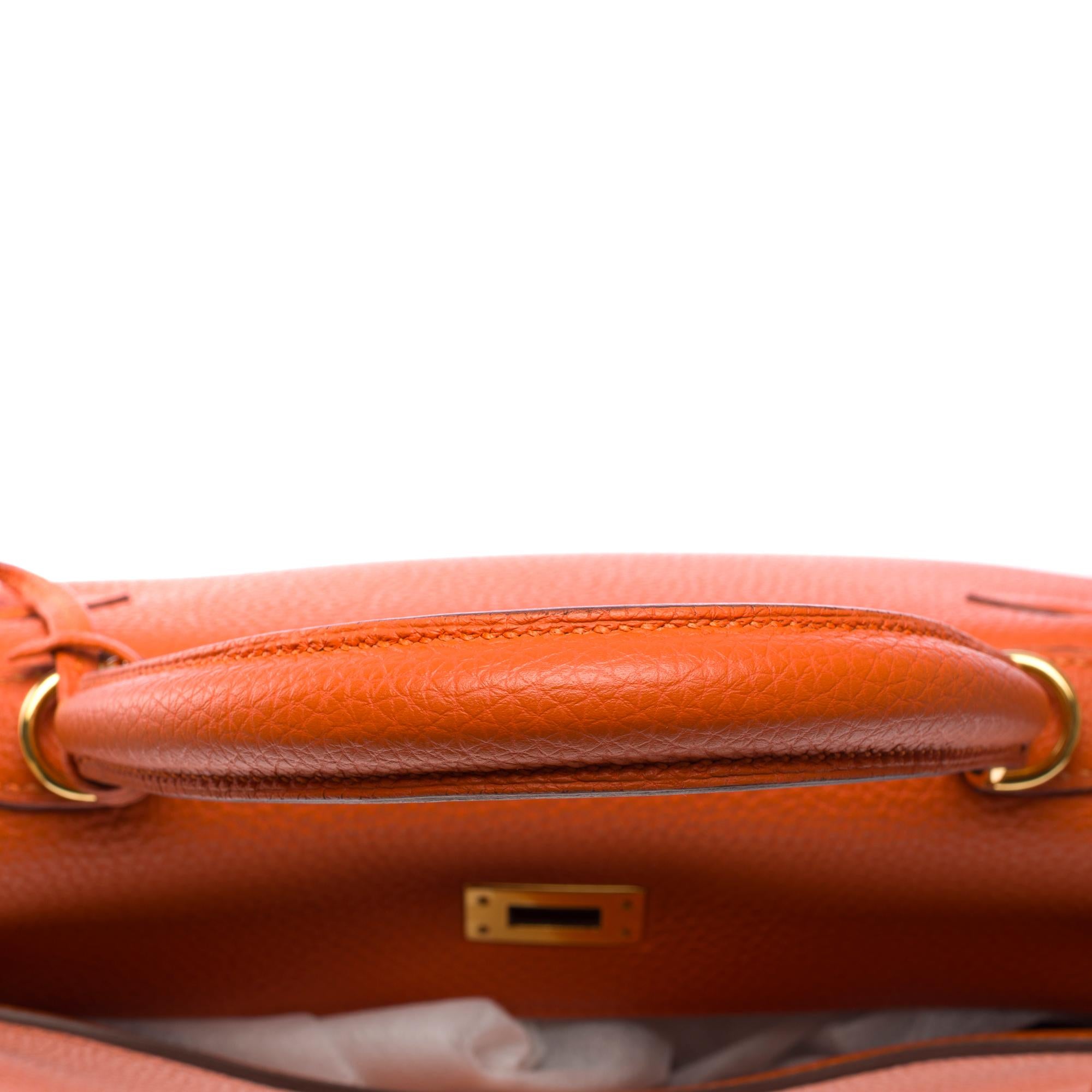 Amazing Hermès Kelly 25 retourne handbag strap in Orange Feu Togo leather , GHW For Sale 6