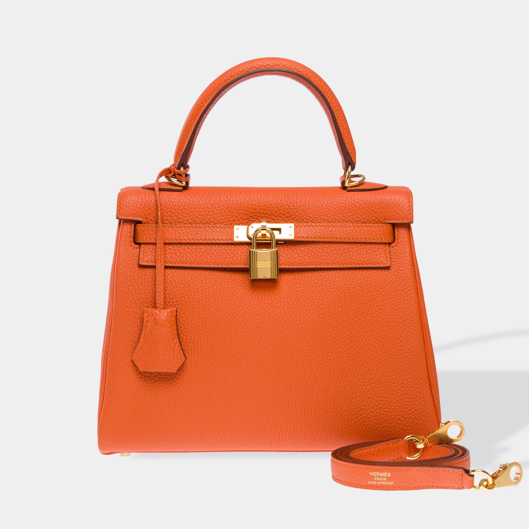 Stunning​ ​&​ ​Bright​ ​Hermes​ ​Kelly​ ​25​ ​handbag​ ​with​ ​shoulder​ ​strap​ ​in​ ​Orange​ ​Feu​ ​Togo​ ​Calf​ ​leather,​ ​gold​ ​metal​ ​trim,​ ​single​ ​orange​ ​Togo​ ​leather​ ​handle,​ ​one​ ​removable​ ​orange​ ​Togo​ ​leather​ ​strap​