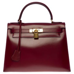 Außergewöhnliche Hermès Kelly 28 sellier Handtasche aus Rouge H Box Kalbsleder, GHW