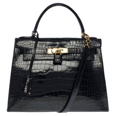 Magnifique bracelet de sac à main Kelly 28 en crocodile Porosus noir Hermès