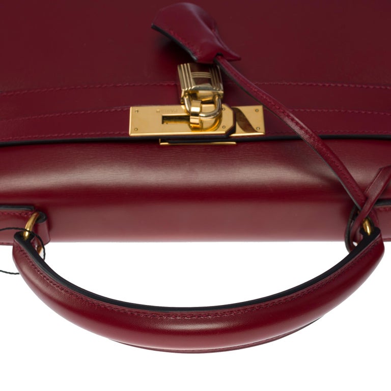 Hermes Kelly 28 retourne handbag strap in Rouge H (Burgundy) box calfskin,  GHW at 1stDibs