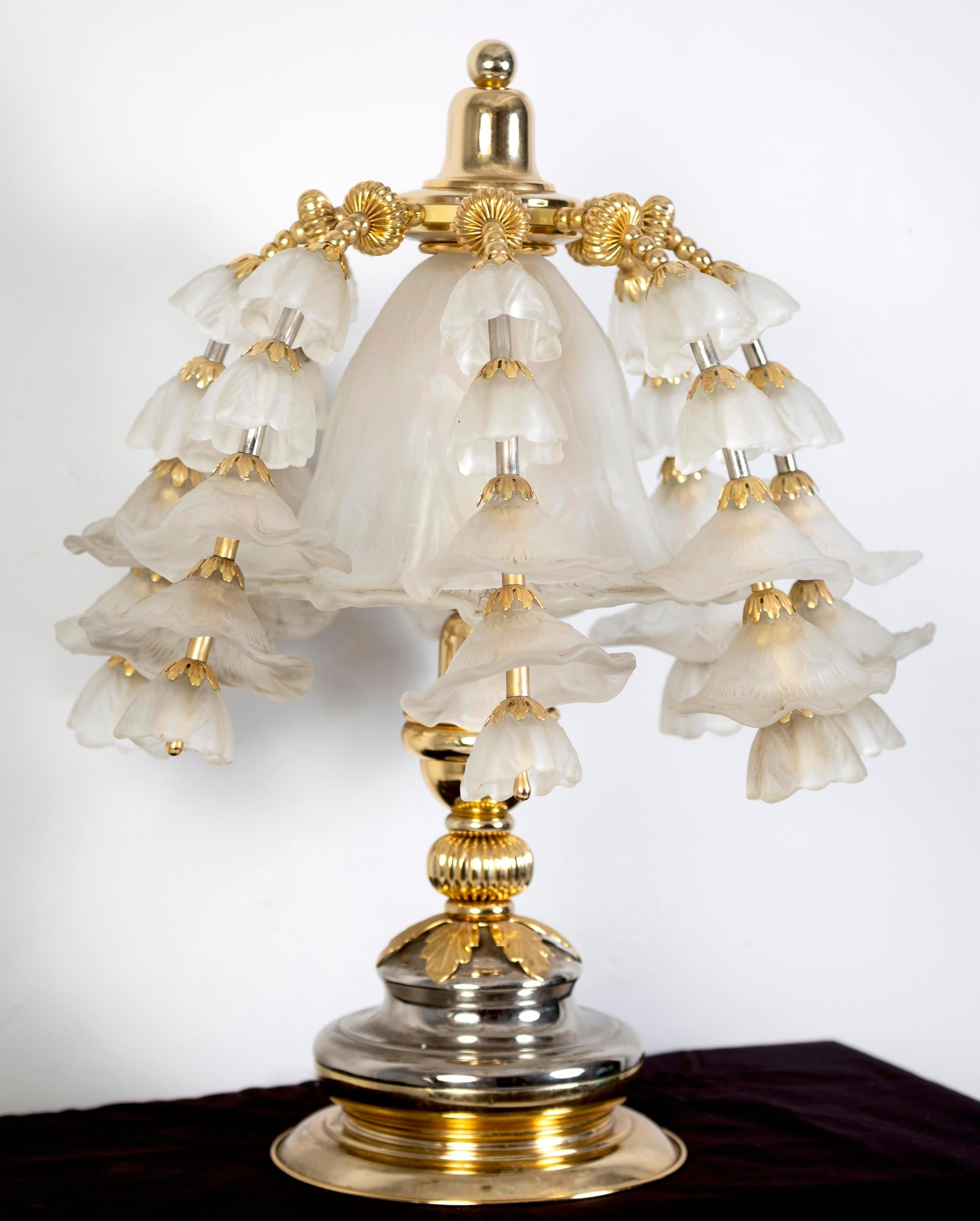 Fabulous vintage Italian  table light by Banci, manufactured by Banci Firenze in 1970s
Brass and chrome  structure decorated with a  a large center lamp shade 
 and with a cascade of  frosted glass flowers.
Very good vintage condition, wear