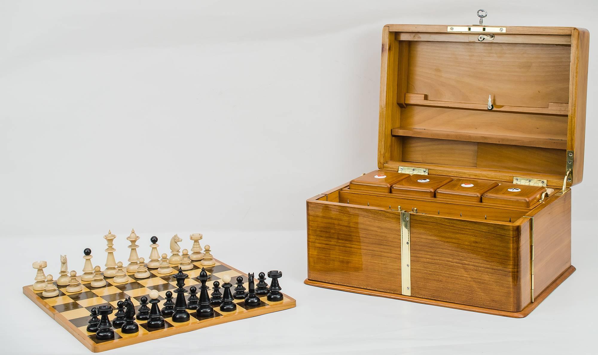 Great Art Nouveau toy box, circa 1905
The outside of the box are polished, everything else is original condition
Rare version in cherrywood
Chess and Mill (Nine Men's Morris) game on a board (including figures)
Four bowls and a dice shaker
Card