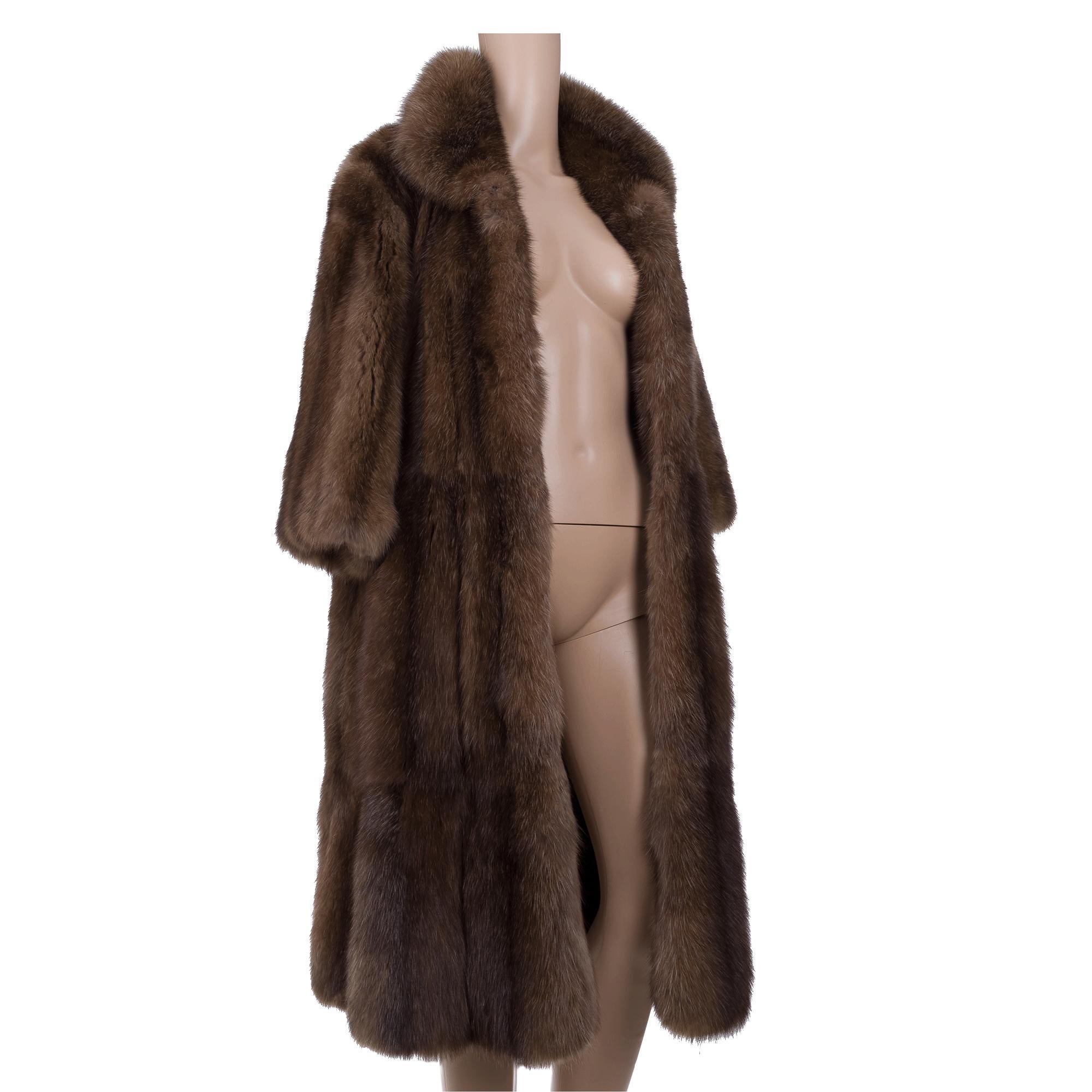 KWKILLICH​ ​Coat​ ​in​ ​Russian​ ​marbled​ ​brown​ ​sable,​ ​small​ ​collar,​ ​closed​ ​by​ ​4​ ​buttons,​ ​two​ ​vertical​ ​pockets,​ ​long​ ​sleeves

Color:​ ​Brown
Material:​ ​Sable
Size:​ ​38
Length:​ ​110​ ​cm​ ​(43.3​ ​inches)

Reference:​