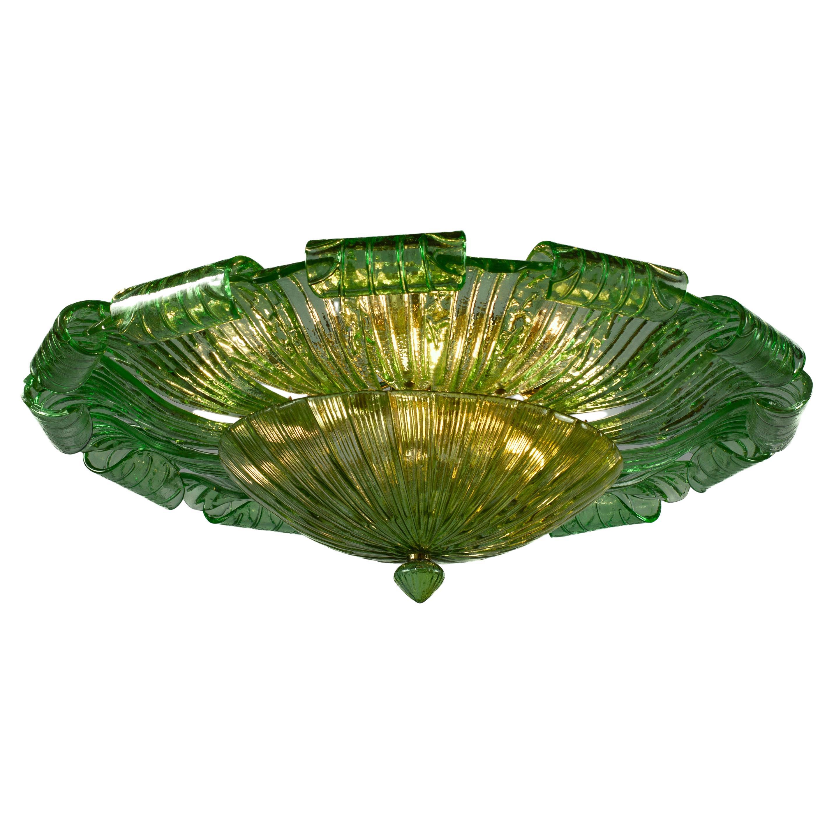 Realized in pure Emerald green color Murano glass consists of 24 large hand-blown leaves.
 The structure is gilt-metal. Nine E27  lights bulbs  spread a magical light.
 Wattage 4-6 W 
 Weight ; 28 kg
 Price is for 1 item 

Available also a