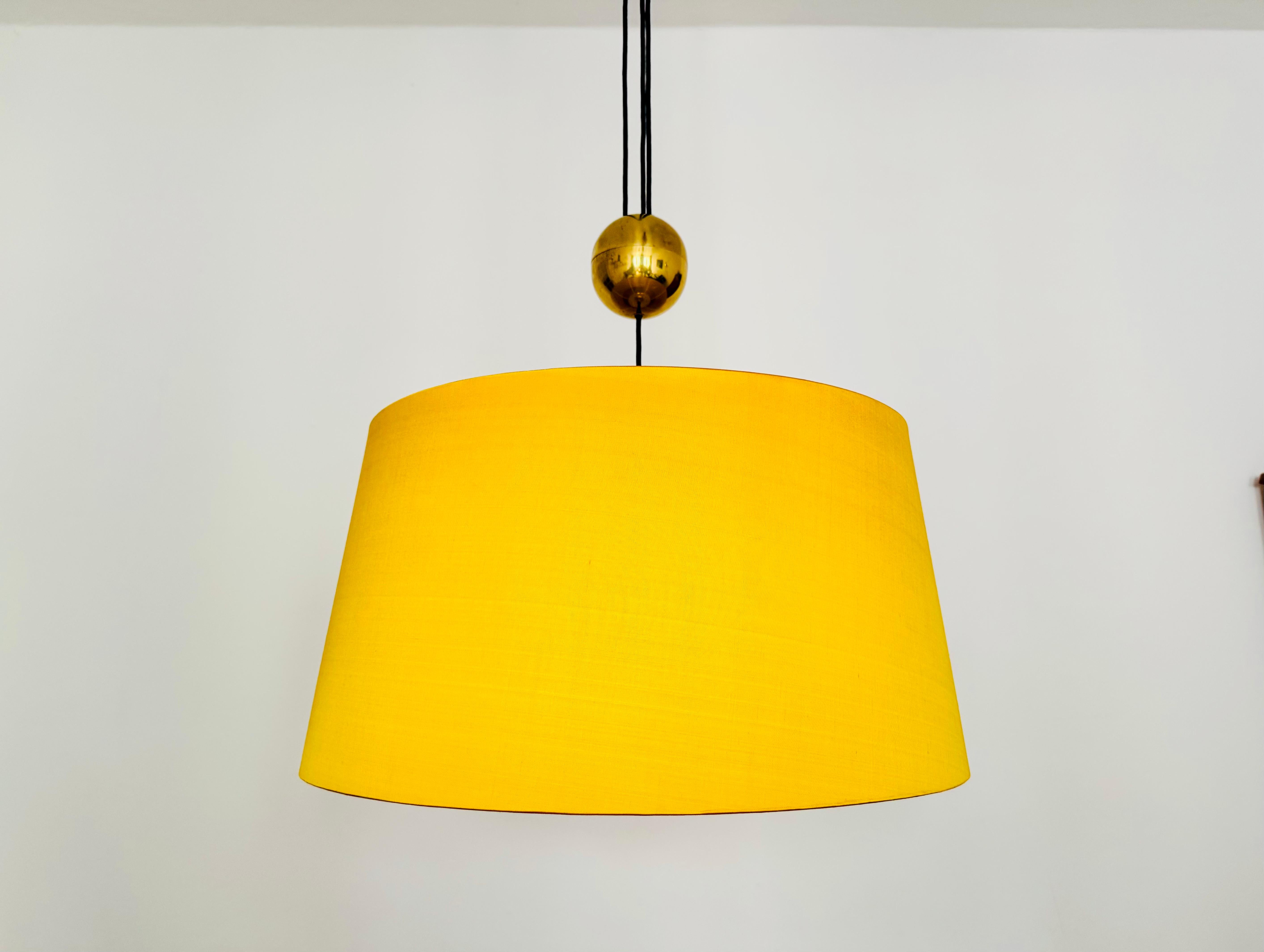 A very rare and large pendant lamp by Adolf Loos from the 1950s.
The high-quality materials, such as the newly upholstered lampshade with wild silk, make this lamp a special design object.
It creates a very cozy light.
Continuously