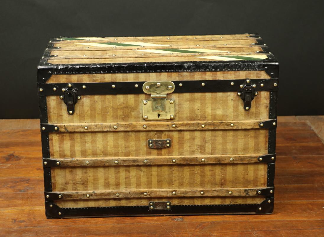 LOUIS VUITTON, 1870/1890
Louis Vuitton Striped Canvas Trunk
• Lock is made of solid brass
• Its handles are made of steel, like the rest of the jewellery 'clasps, angles...)
• Interior has been redone,
• Original label
• An underside wooden slat has