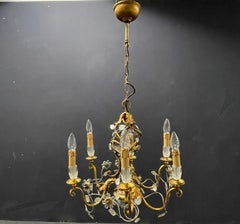 Amazing Crystal and Gilt Metal Bagues style chandelier.