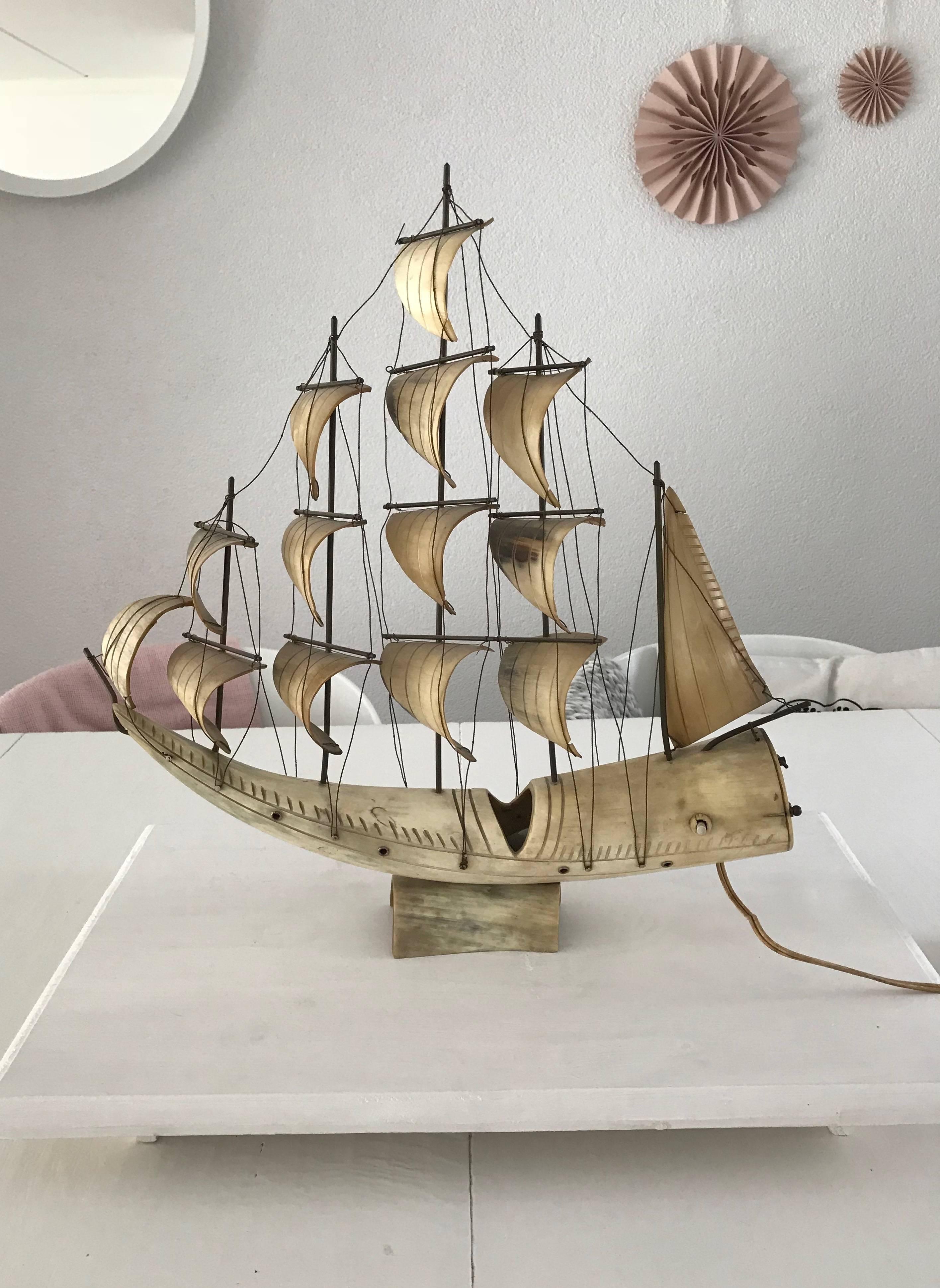 Artistic and very well made, five masted sailing boat table lamp.

If you are a sailing boat enthousiast or if you work in a marina or if you are decorating an interior with a sailing or maritime theme then this wonderfully hand-crafted five-master