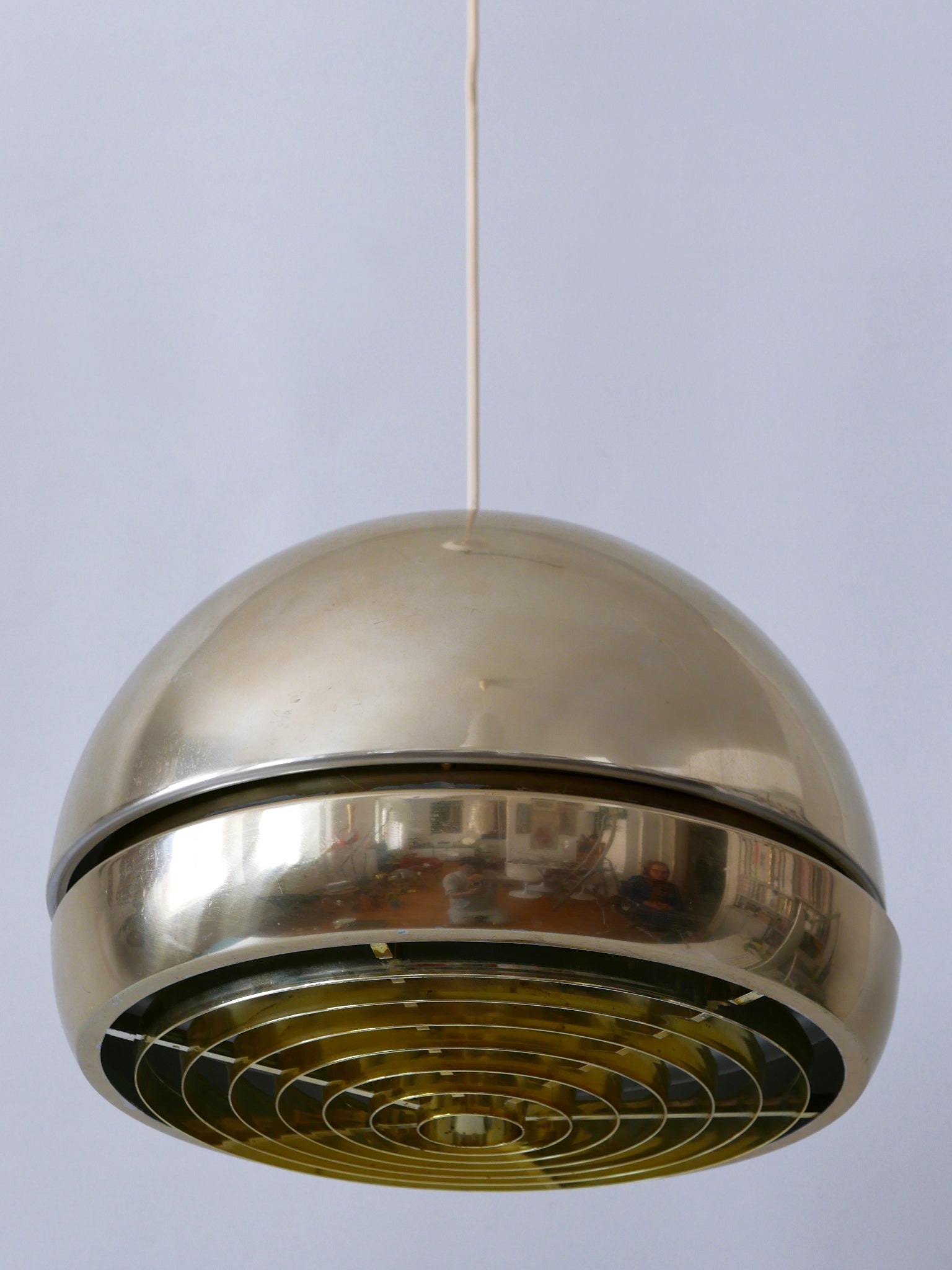 Rare, elegant and highly decorative Mid-Century Modern aluminum pendant lamp or hanging light. Designed and manufactured probably in Sweden, 1960s.

Executed in anodized aluminum and plastic reflector, the pendant lamp needs 1 x E27 / E26 Edison