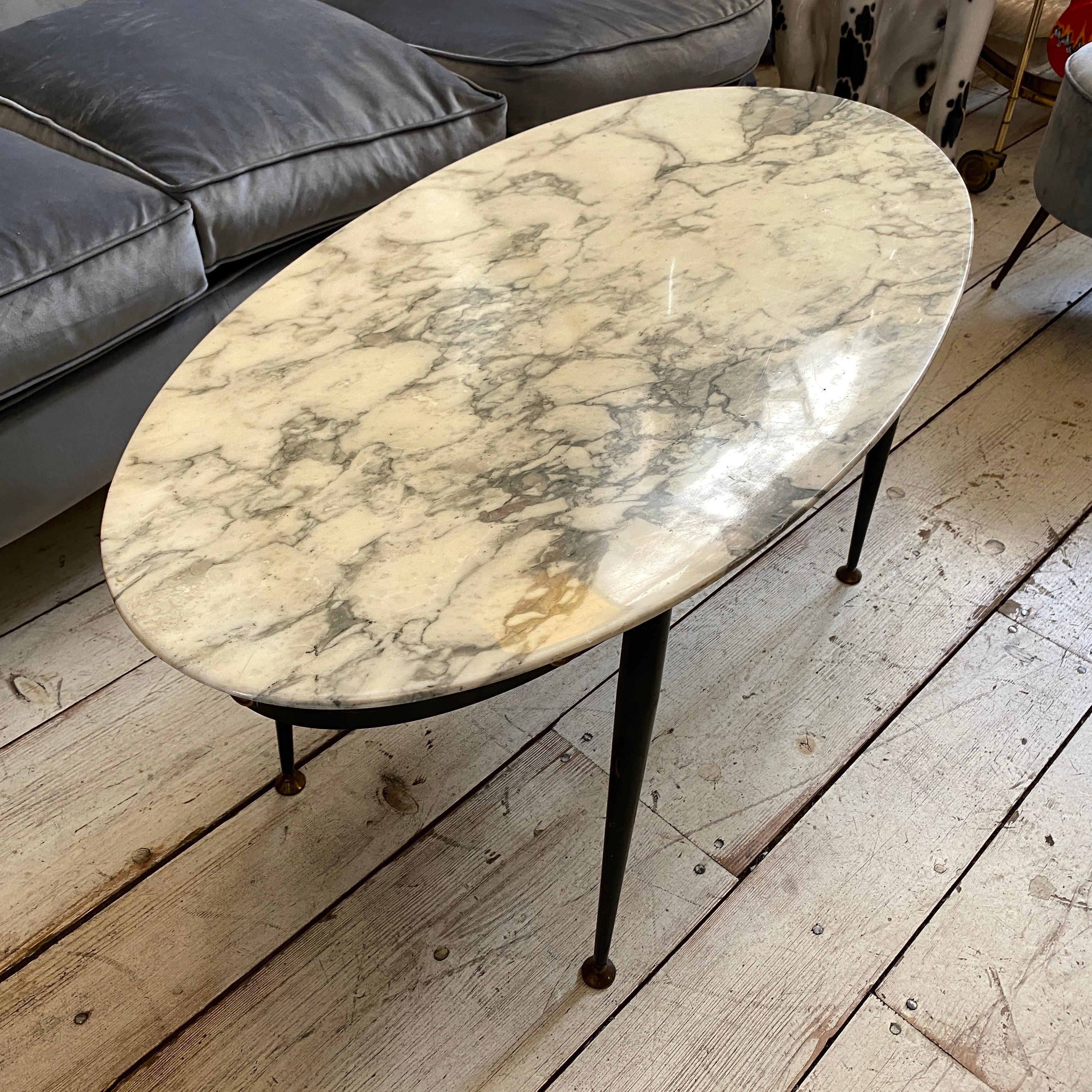 An high quality brass and white and gray Carrara marble side table made in Italy in the 1950s. It's in perfect conditions.