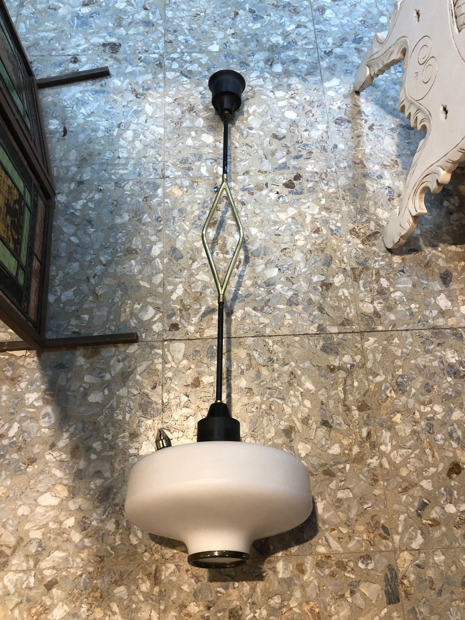 Amazing, Stilnovo style chandelier Space Age brass and opaline glass, 1970 Italy.
Good condition, original patina, runs at 110-240 volts and needs a normal E27 bulb.
A professional electrician checked and wired the chandelier to work in the US, UK