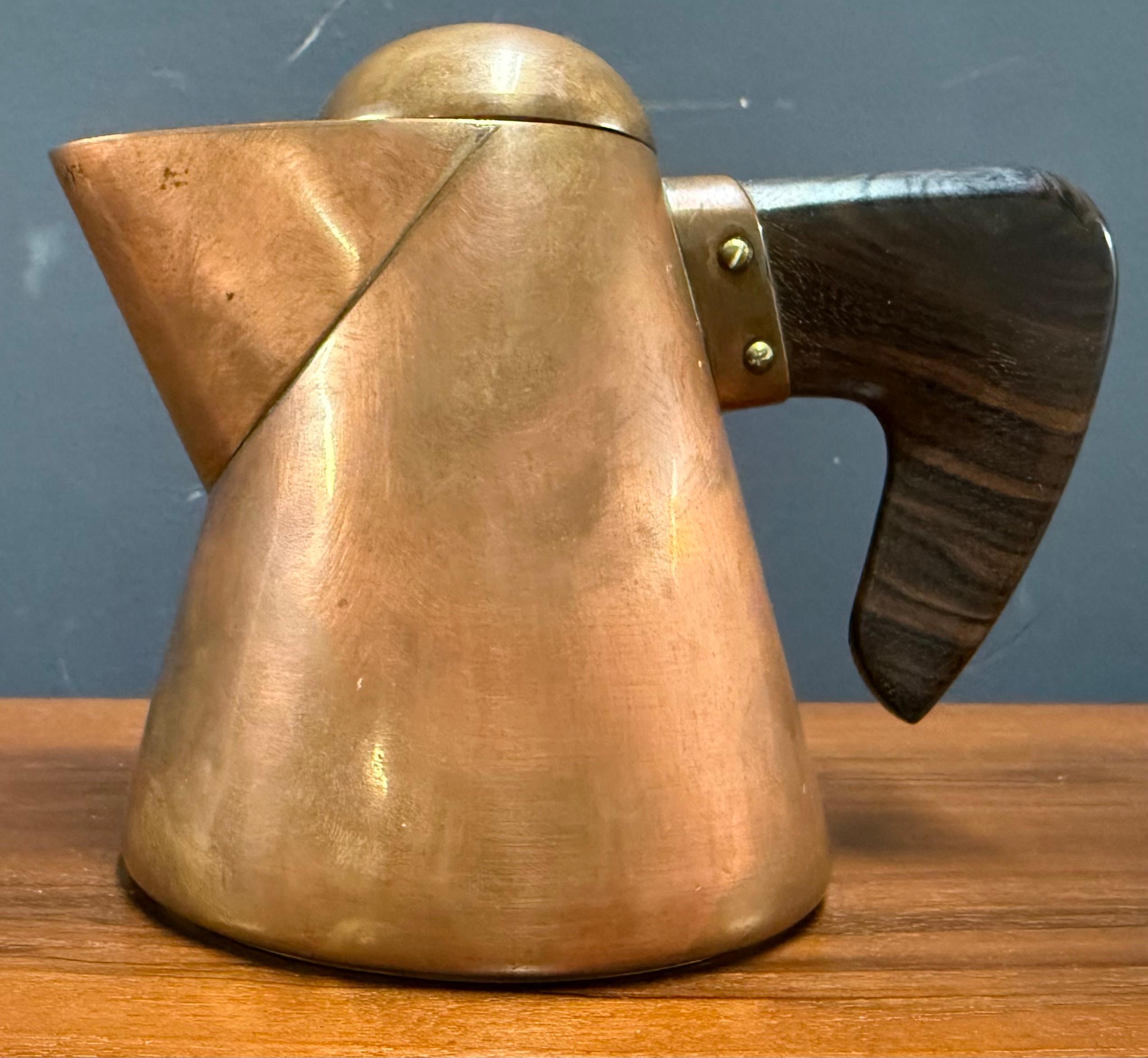 wonderful coffee pot from copper with brass bottom. inside nickel plated and with an organic carved wood handle. handmade by steinböck / austria.