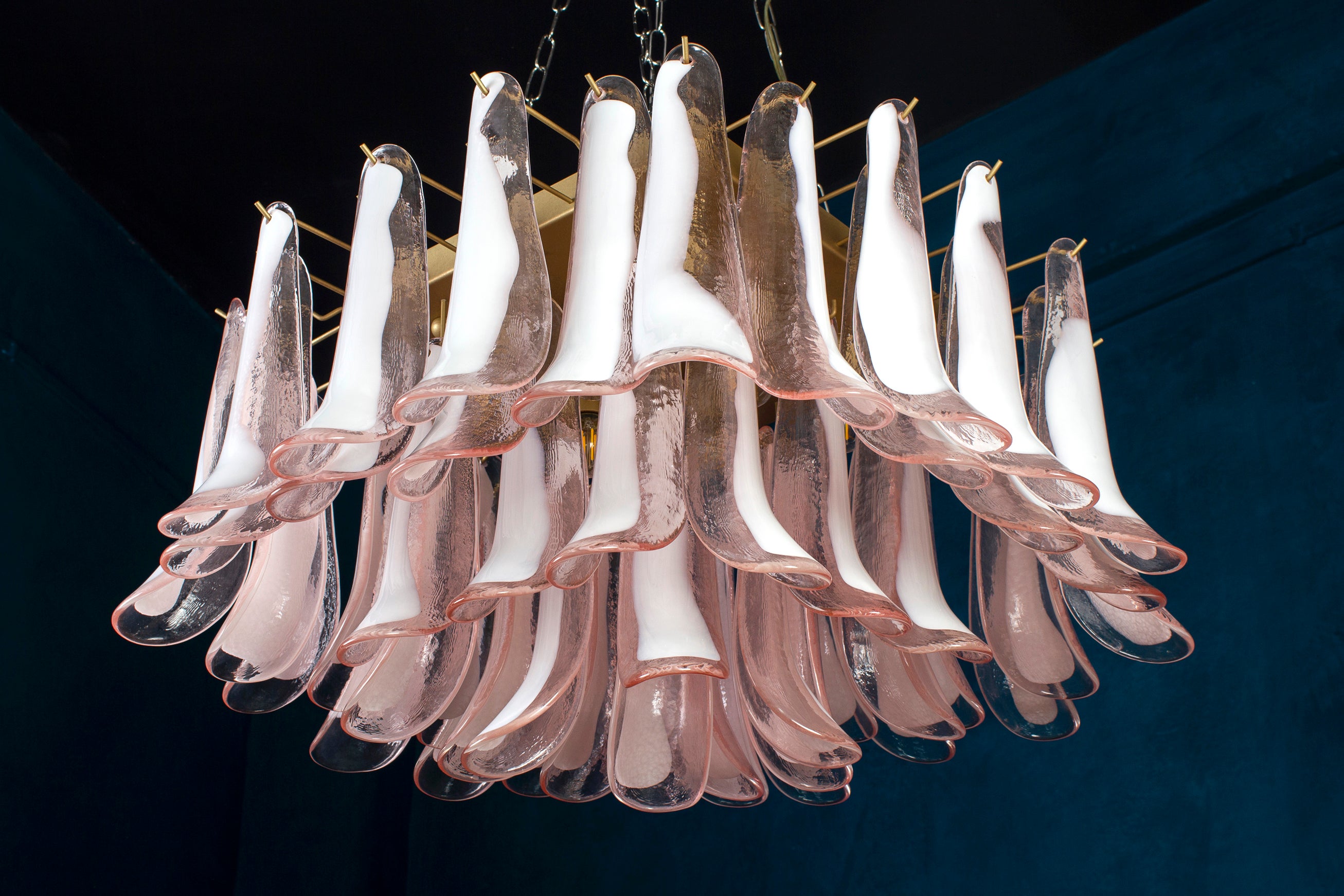 Amazing Italian square shaped Murano glass chandelier, made by pink and white “lattimo” glass petals. Brass frame with four E 14 light bulbs.
Perfect vintage condition.
