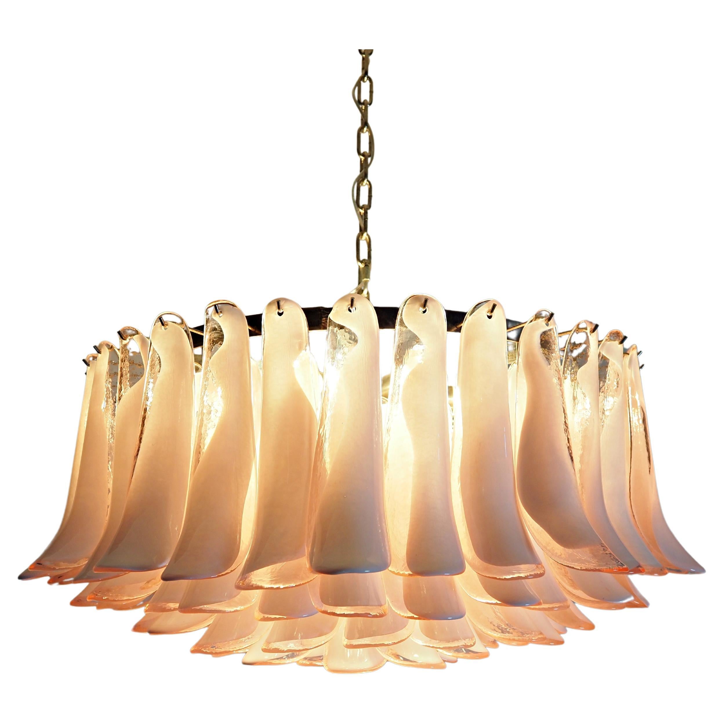Italian vintage chandelier in Murano glass and nickel plated metal structure. The armor polished nickel supports 101 glass petals (pink and white “lattimo”) that give a very elegant look. Can be used as a chandelier with chain, or as a ceiling